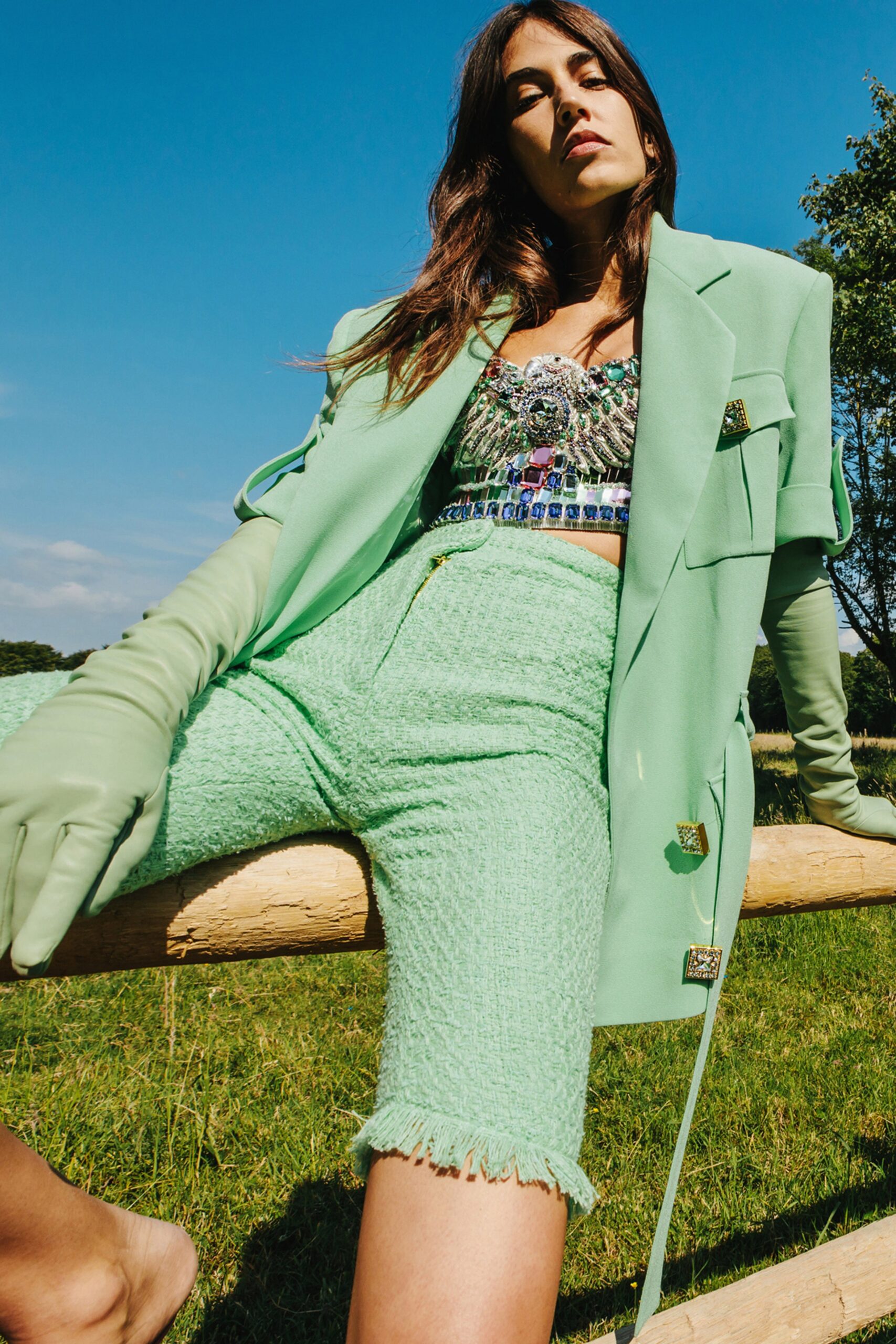 green blazer with multi-colored top