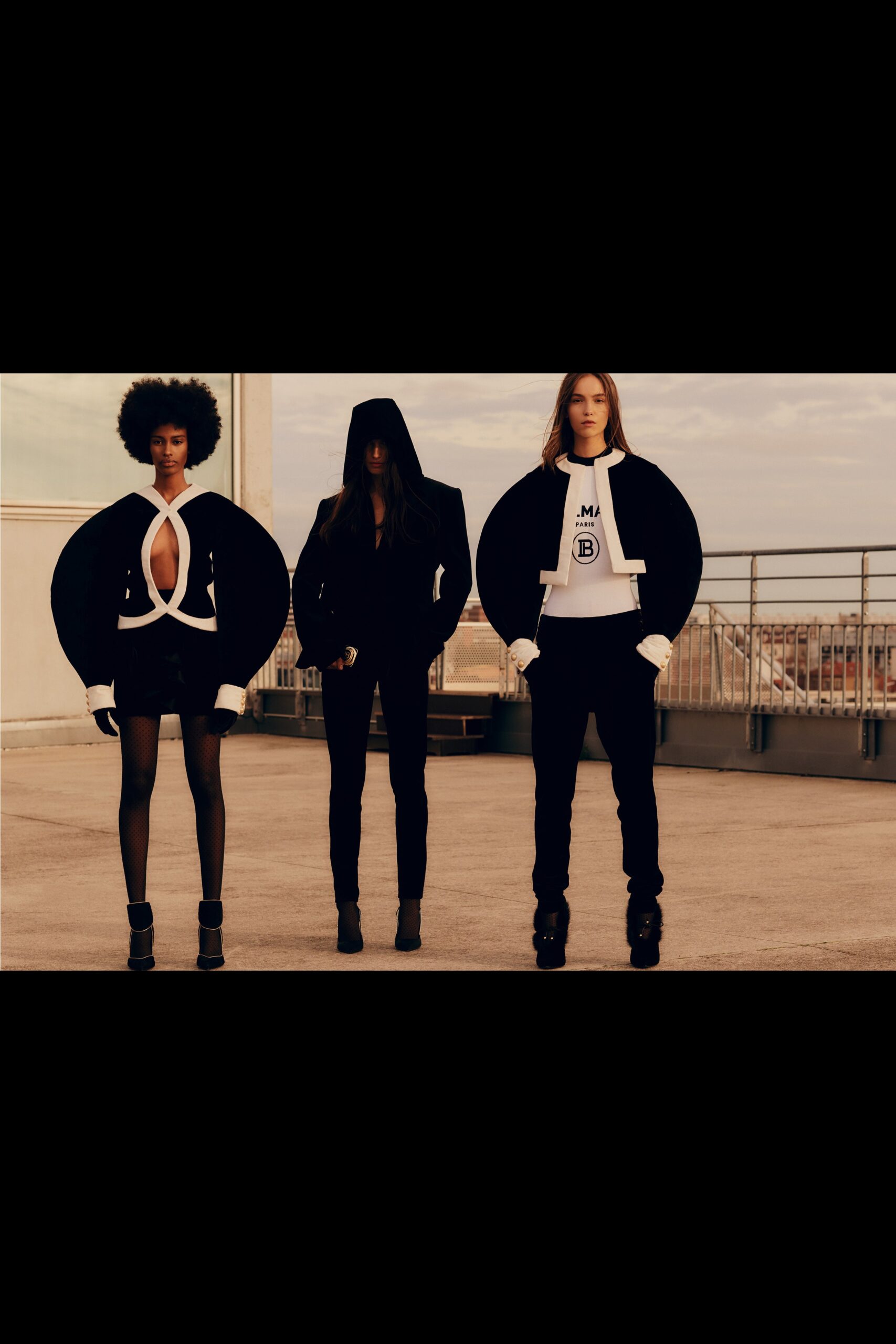 black fitted mini dress and jackets