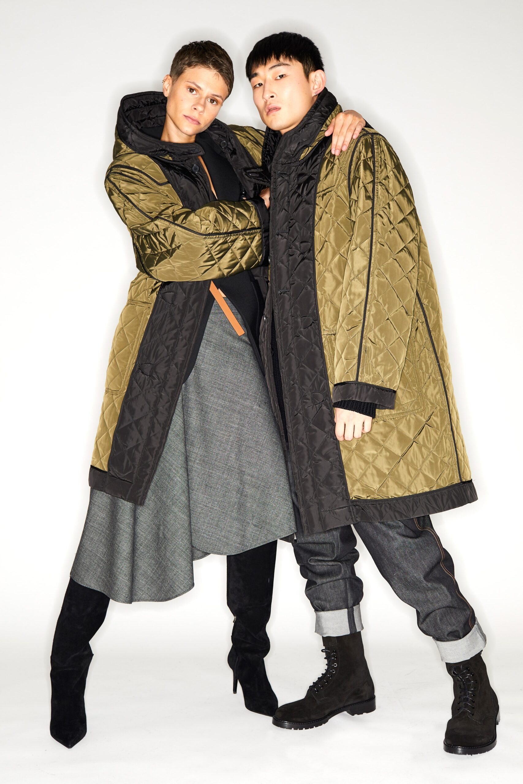 black and green quilted coat with pleated skirt