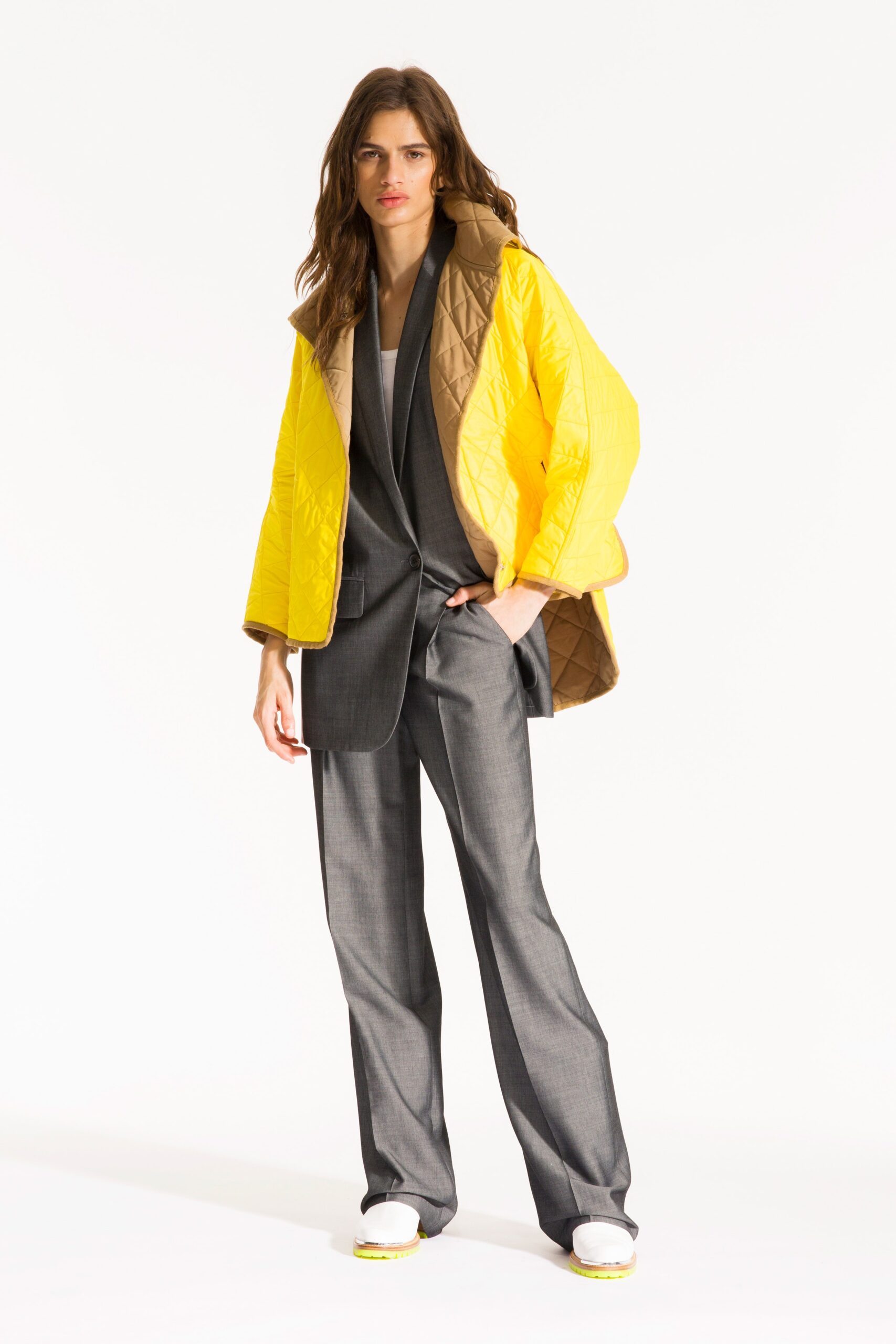 yellow quilted jacket with gray suit