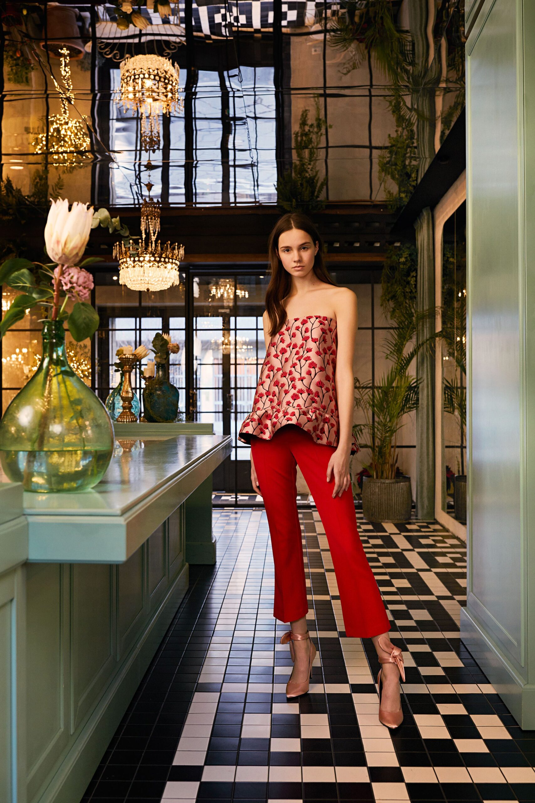 red and white silk top with fitted pants