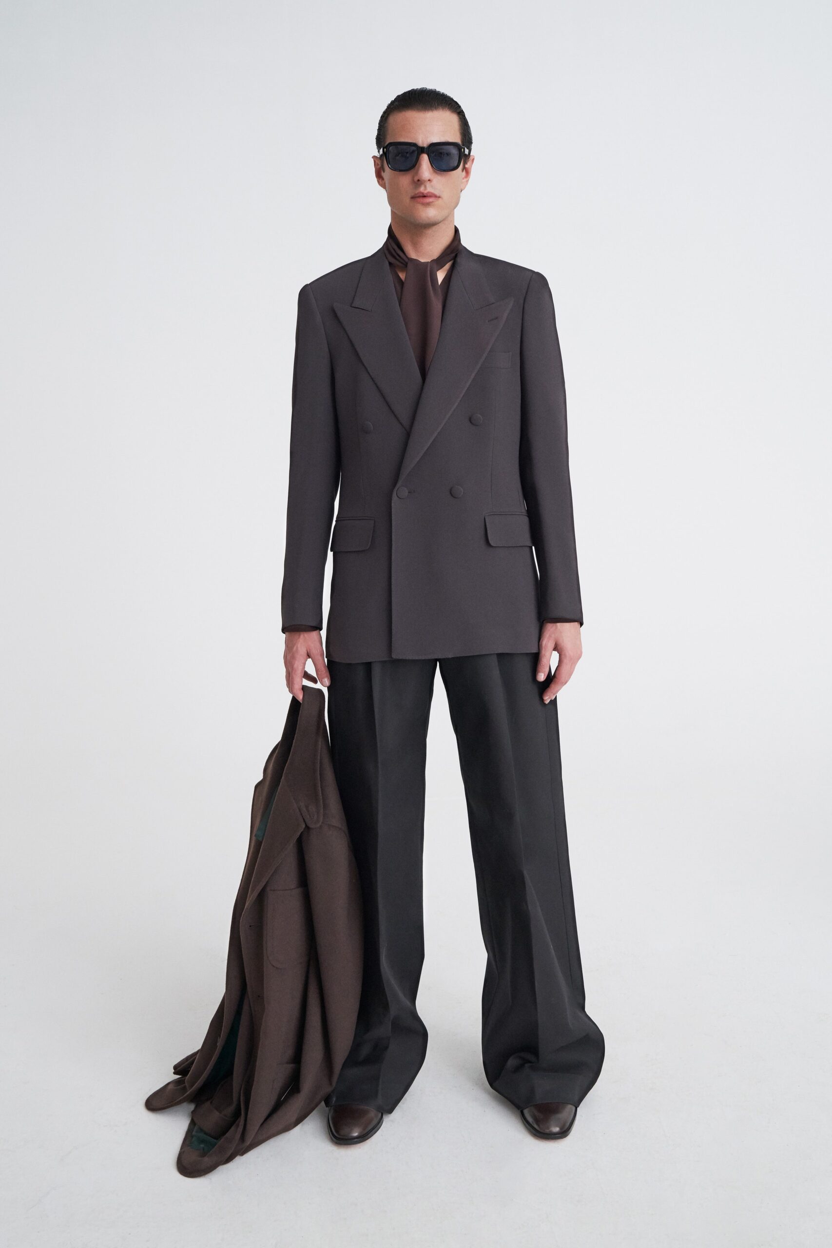 brown tailored blazer with black pants
