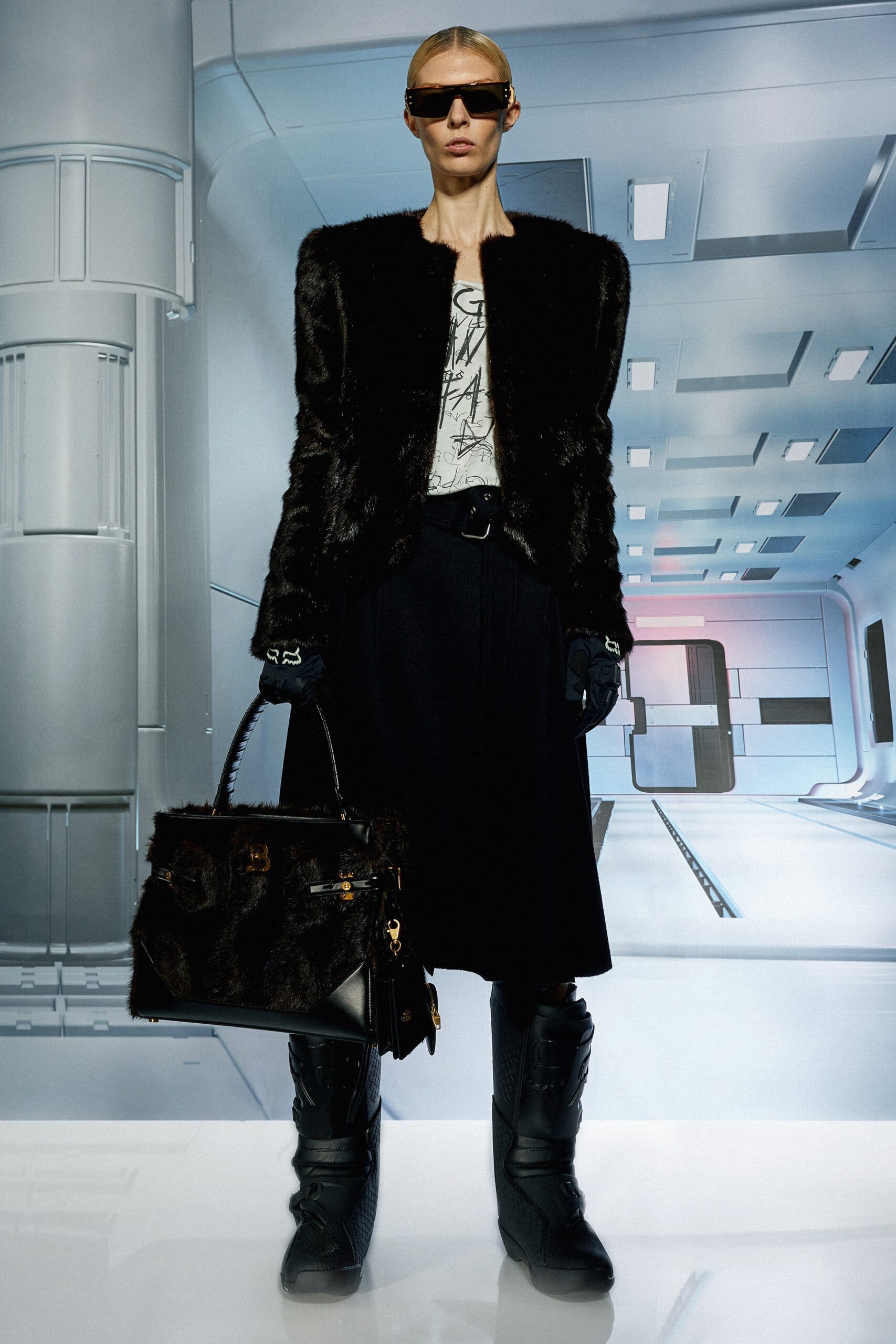 black faux-fur jacket with midi skirt