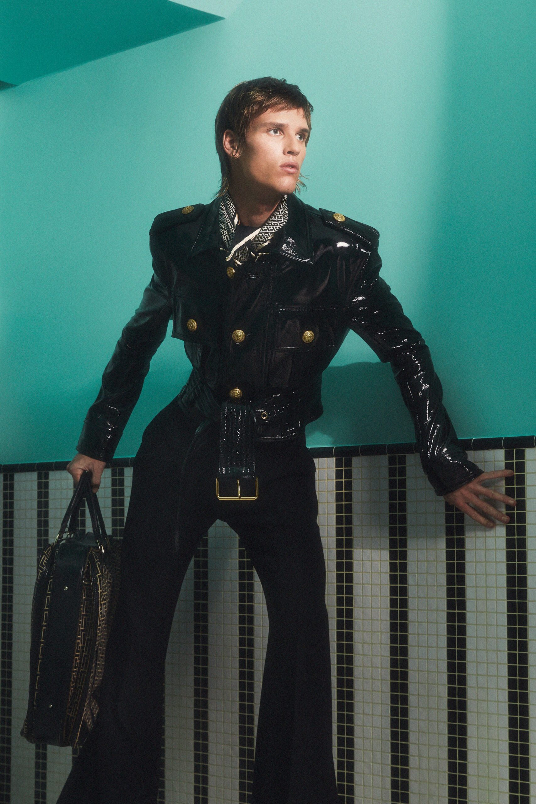 black leather long-sleeve collared fitted buttoned shiny jacket
