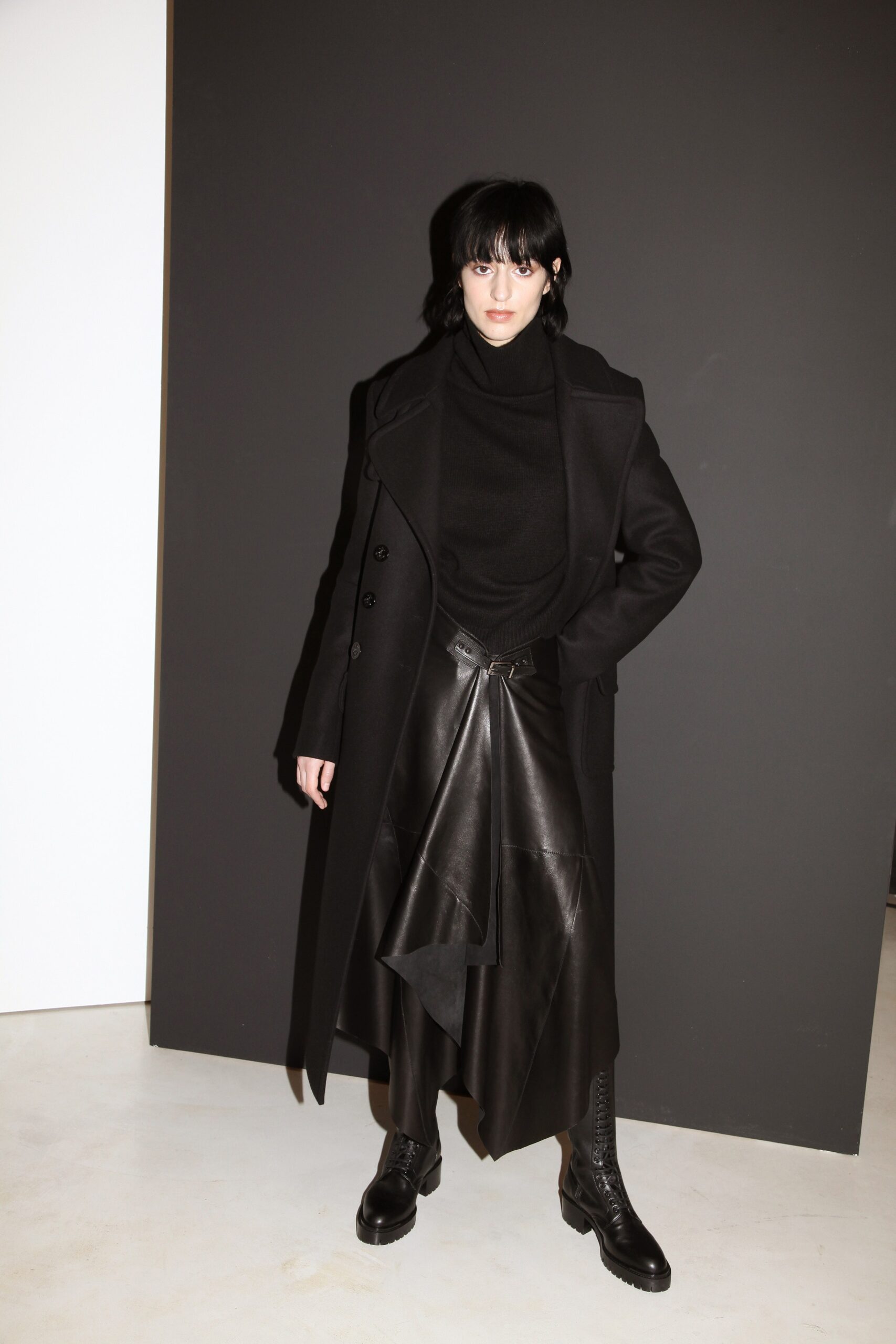 black wool coat with leather skirt