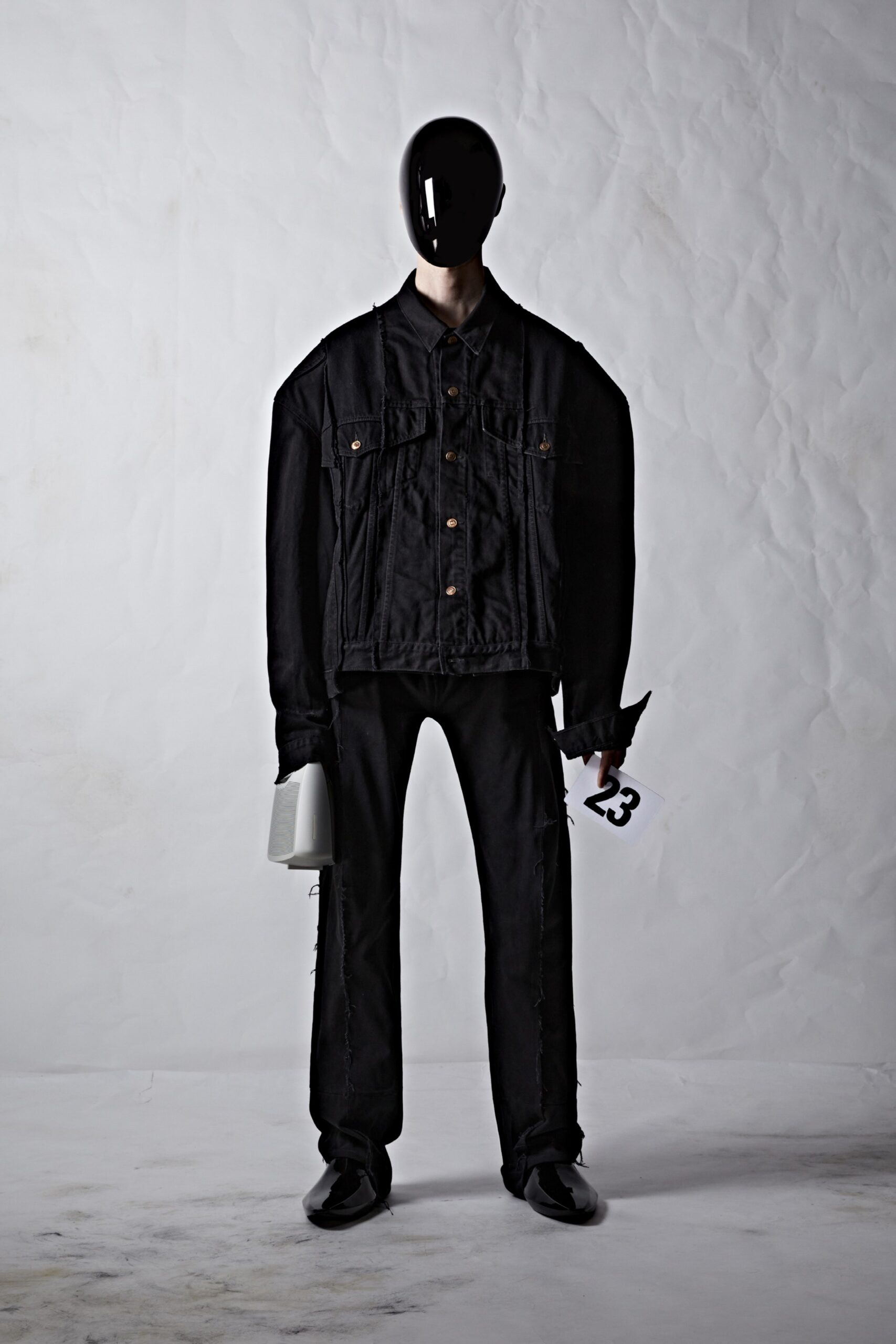 oversized black denim jacket and relaxed pants