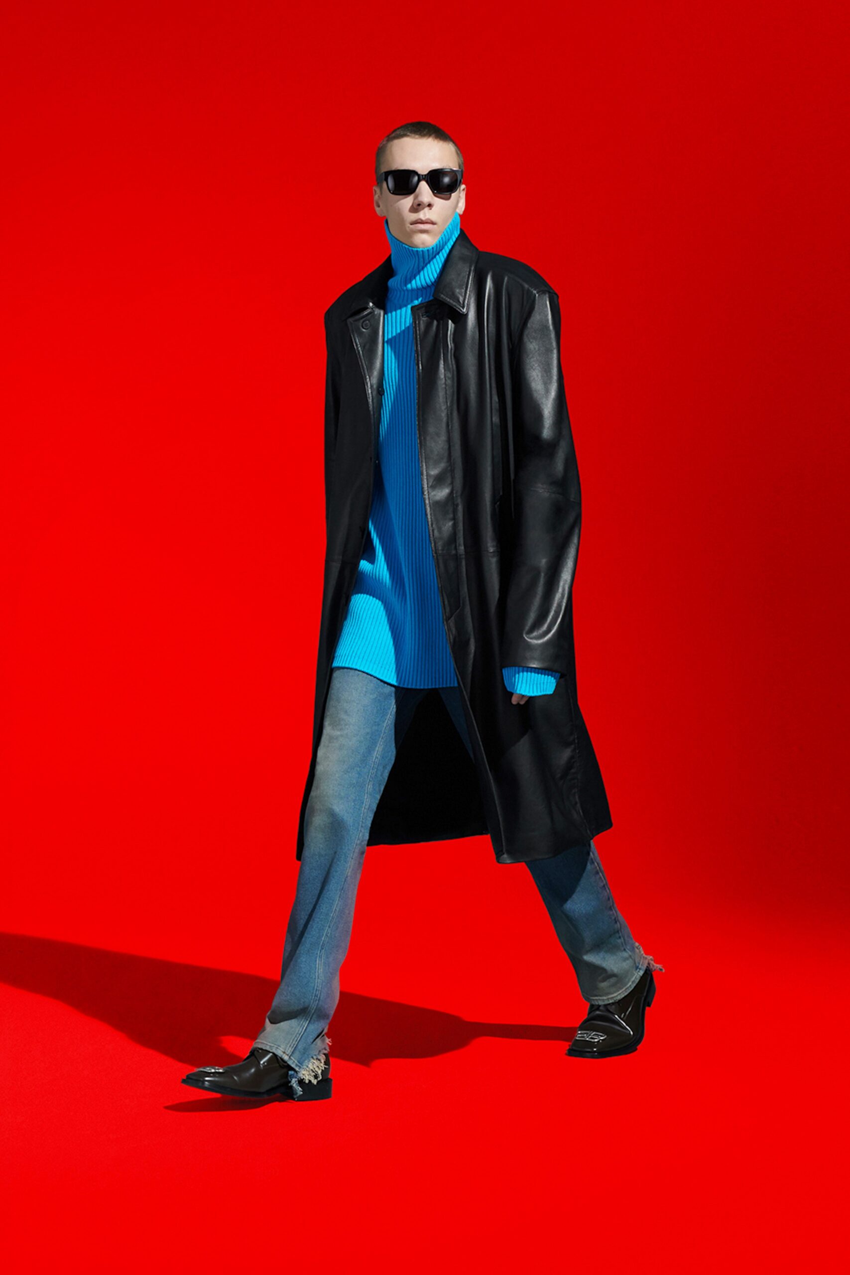 black leather coat with blue sweater