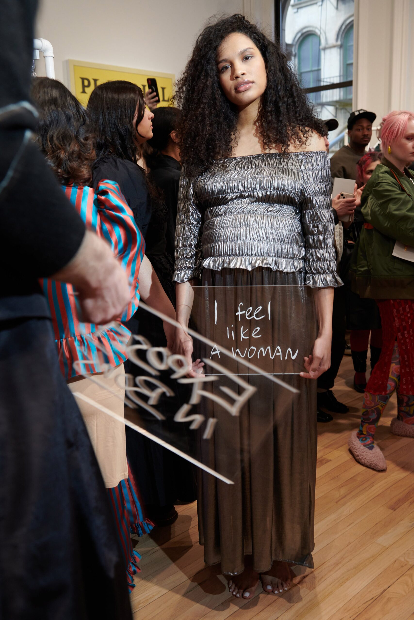 silver off-shoulder top with brown tiered skirt