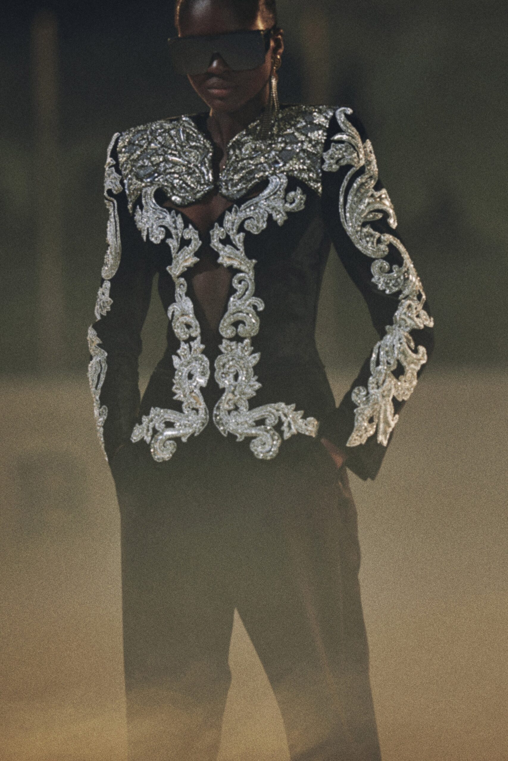 black embroidered jacket with tailored pants
