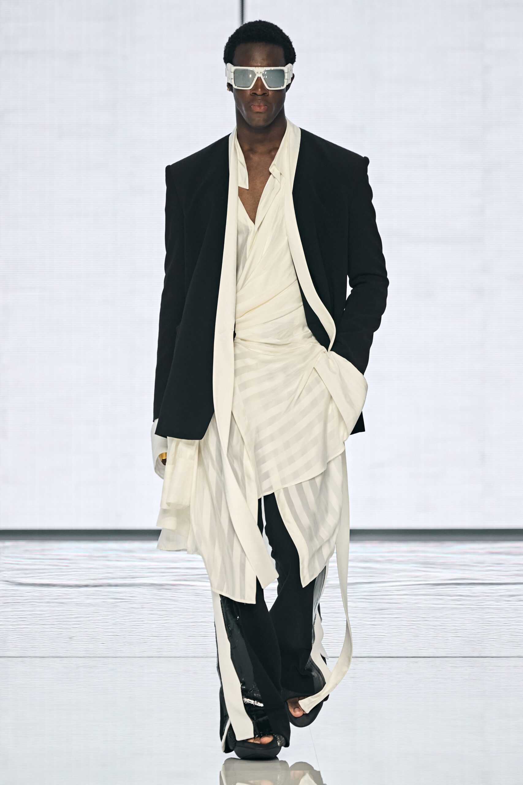 black tailored blazer with white top