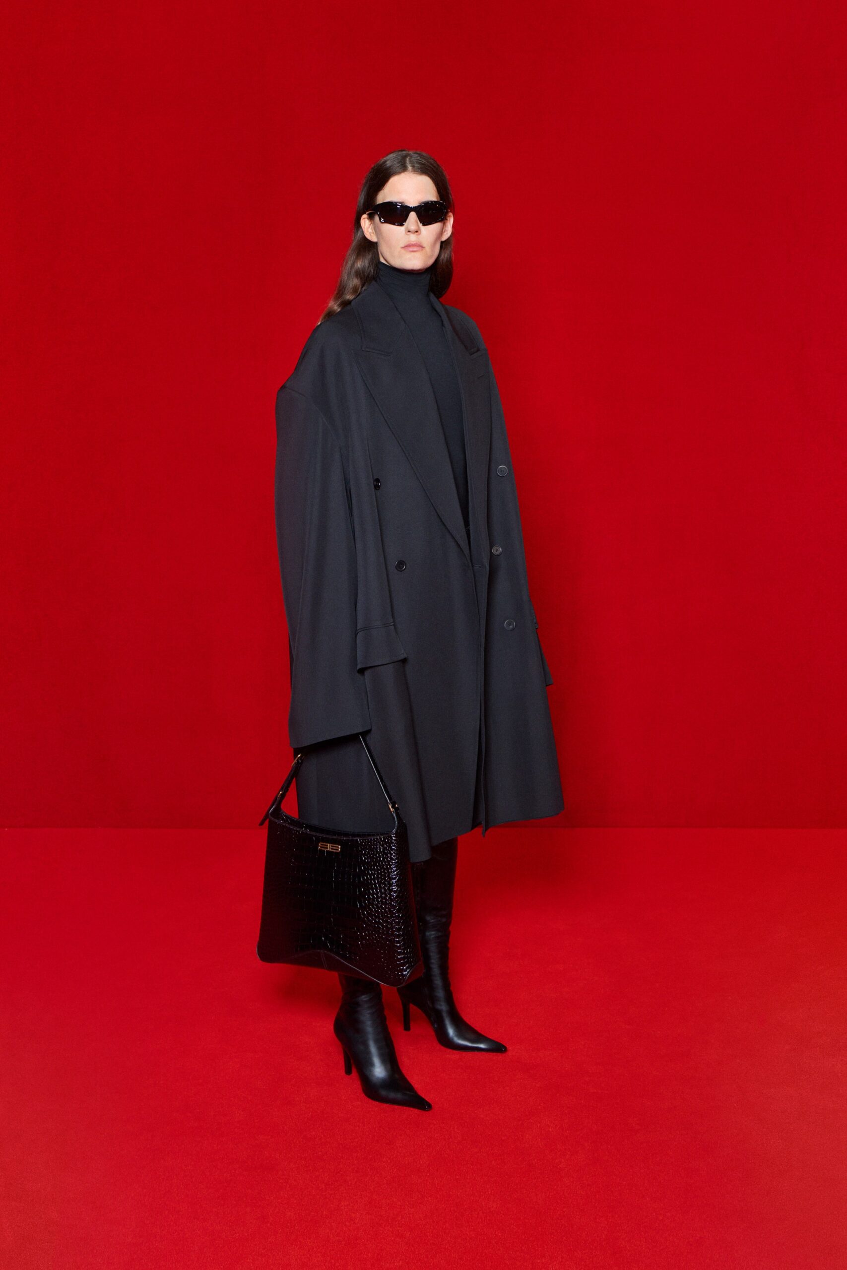 black wool long-sleeve collared oversized layered coat