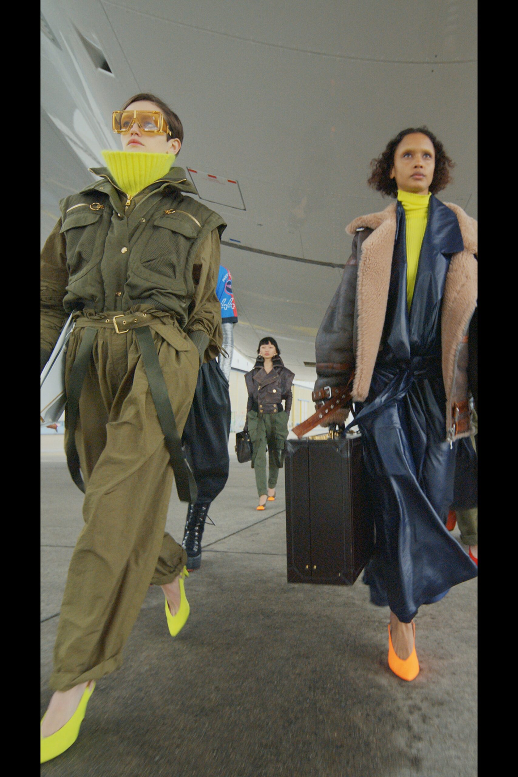 green jumpsuit beige coat blue dress