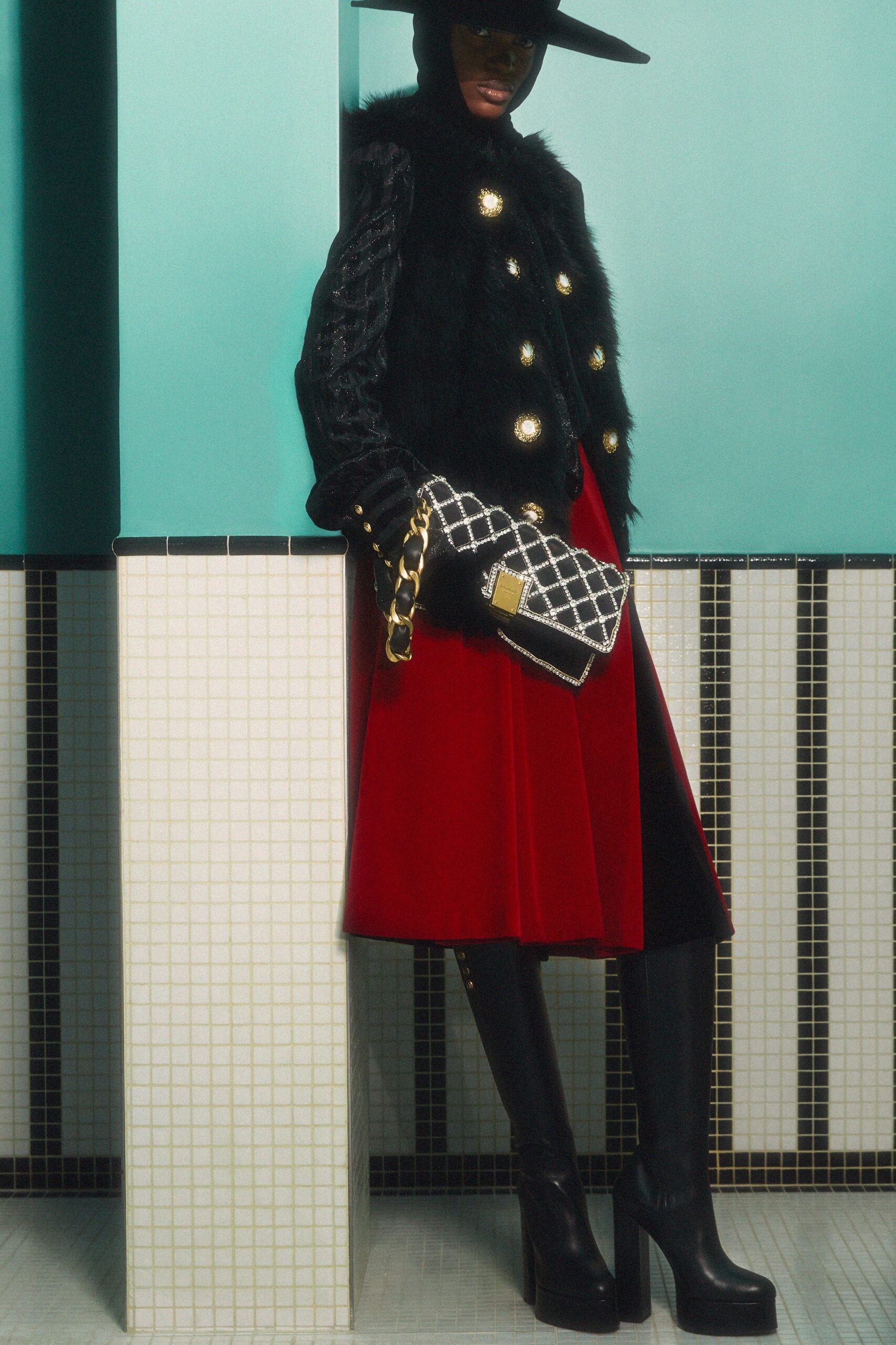 black fur vest red pleated skirt