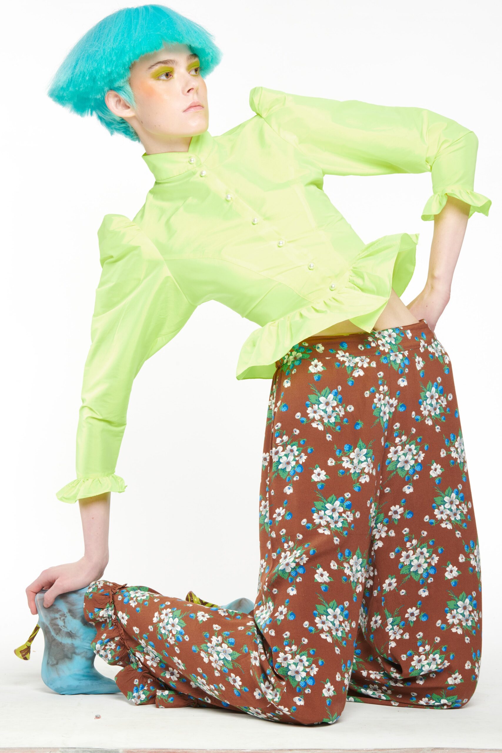 green silk blouse with floral pants