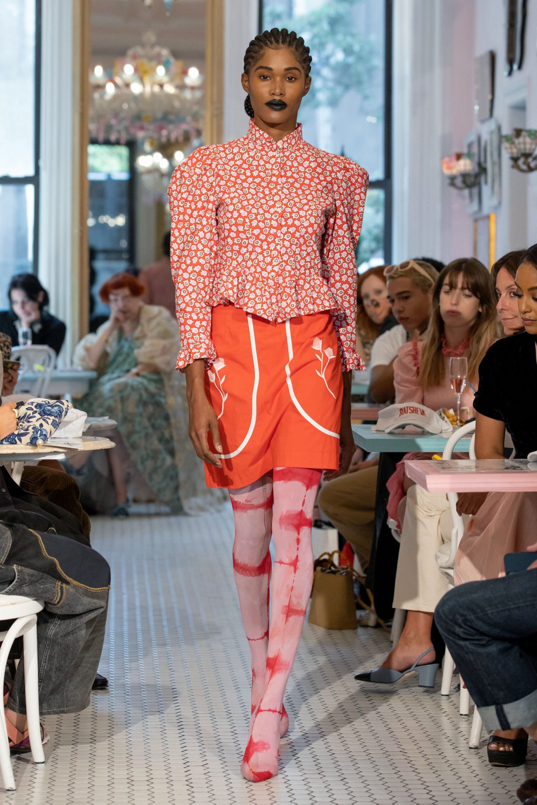 red printed blouse orange skirt