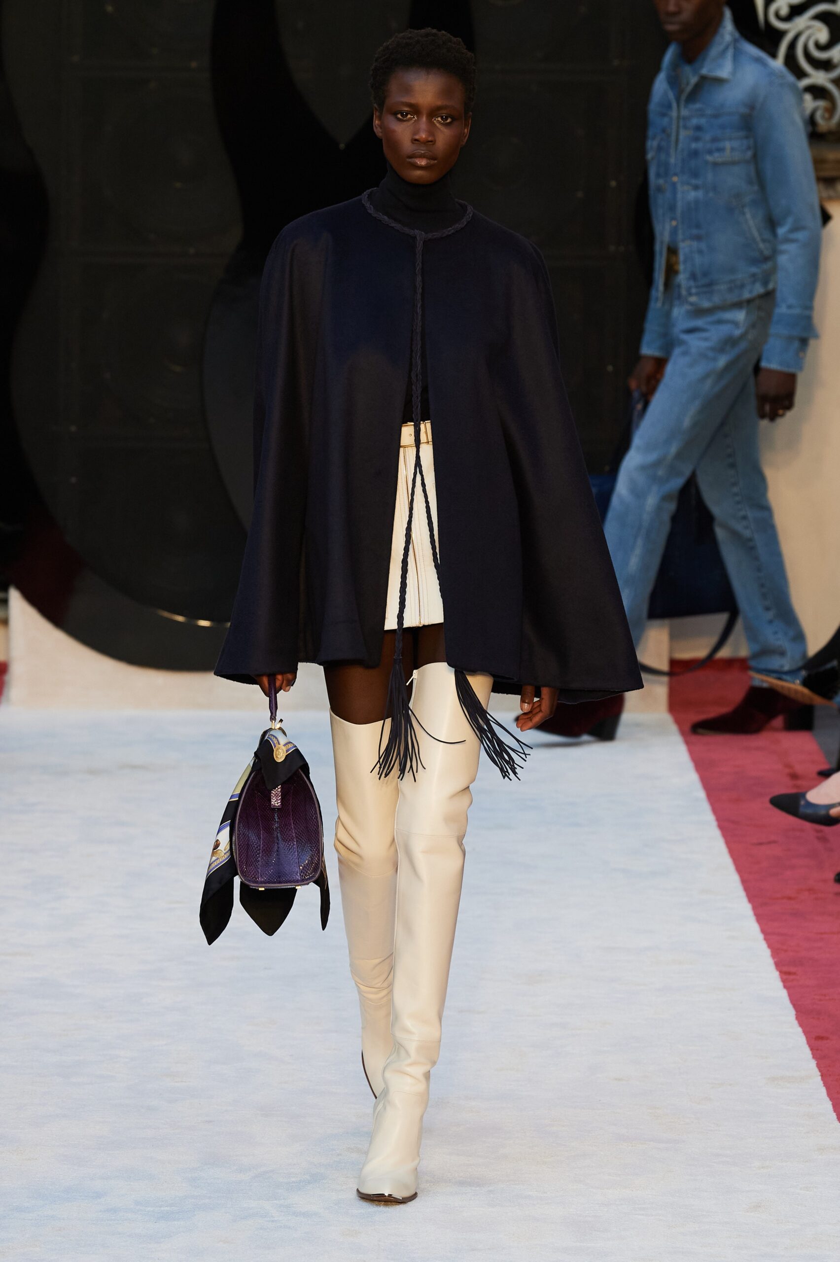 navy cape with white mini skirt