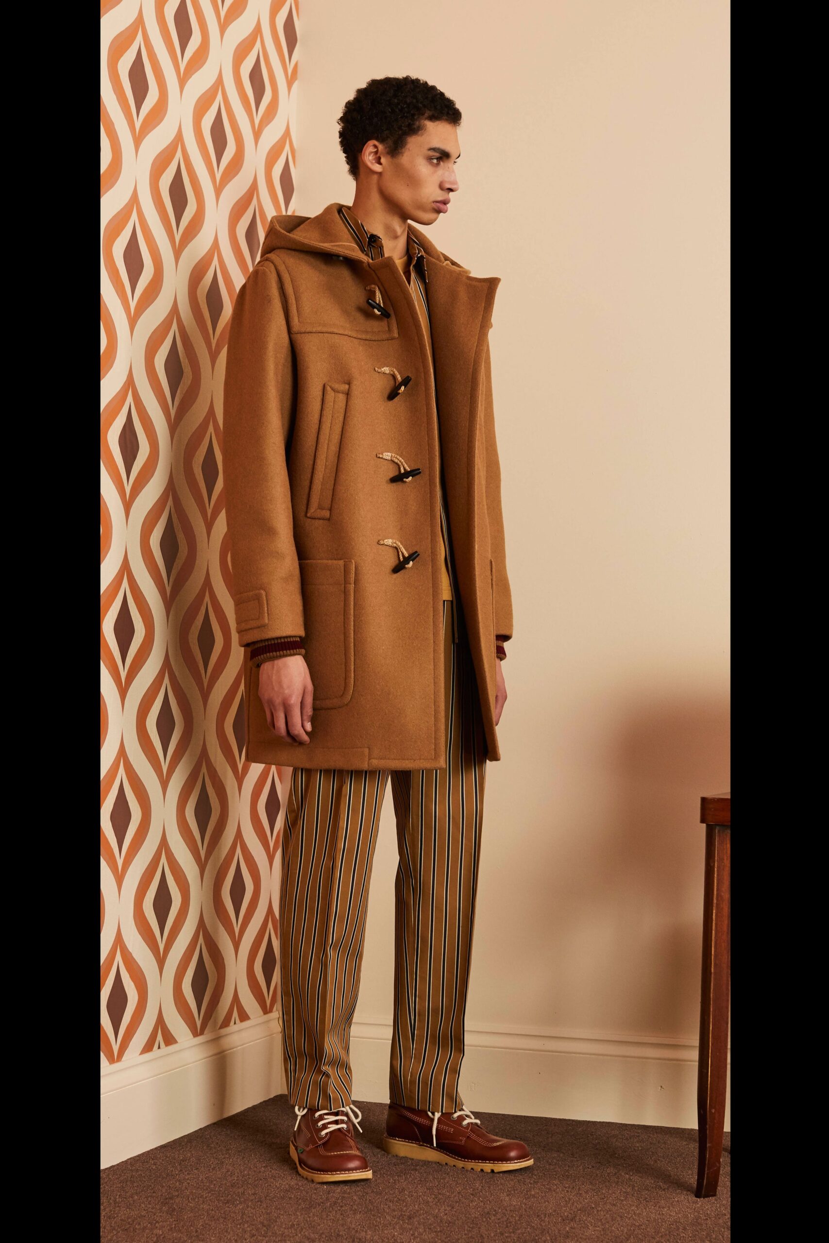 brown wool coat and striped pants
