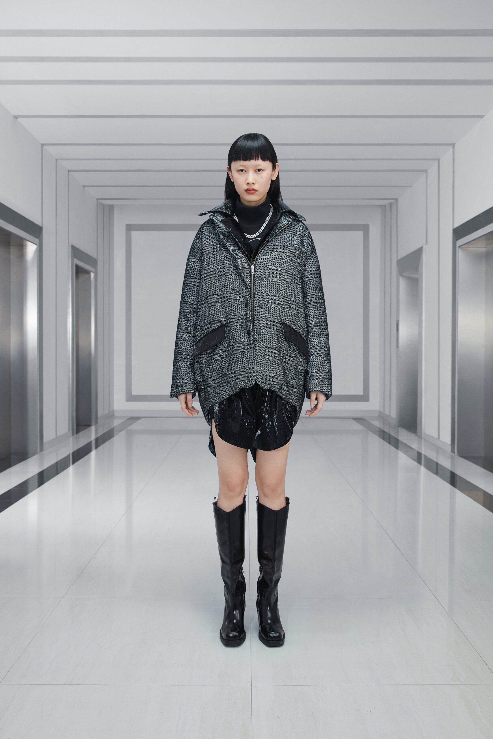 black and white checked jacket with leather shorts