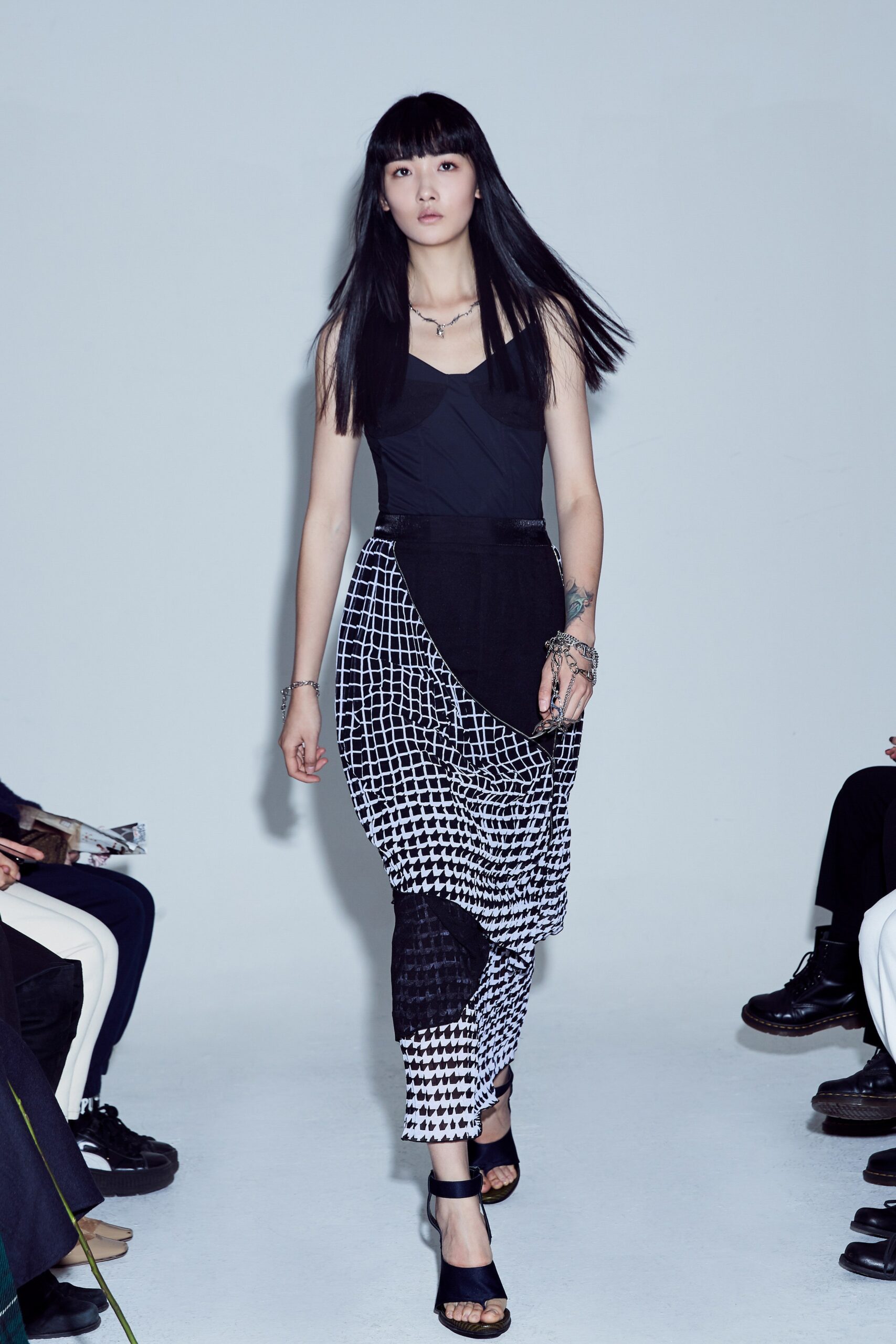 black fitted top with printed pants