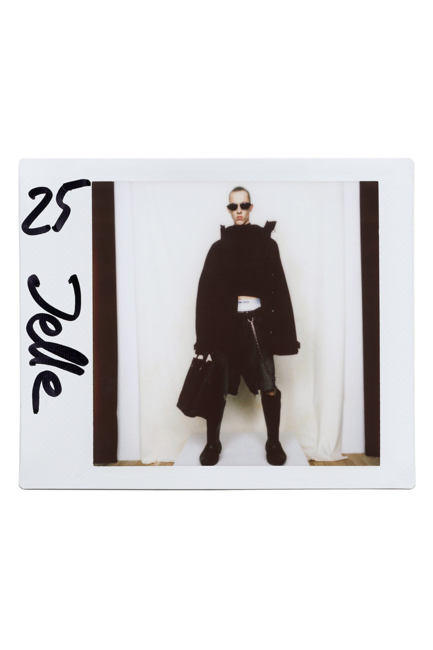black wool long-sleeve collared oversized layered coat