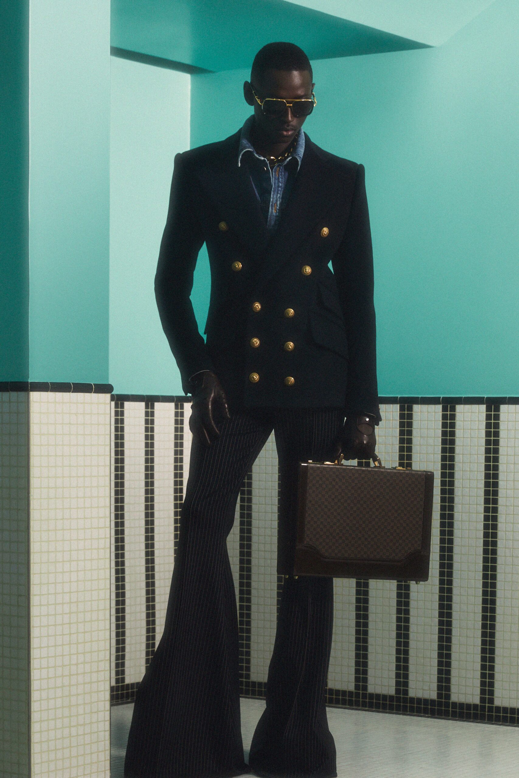 tailored black blazer with flared pants