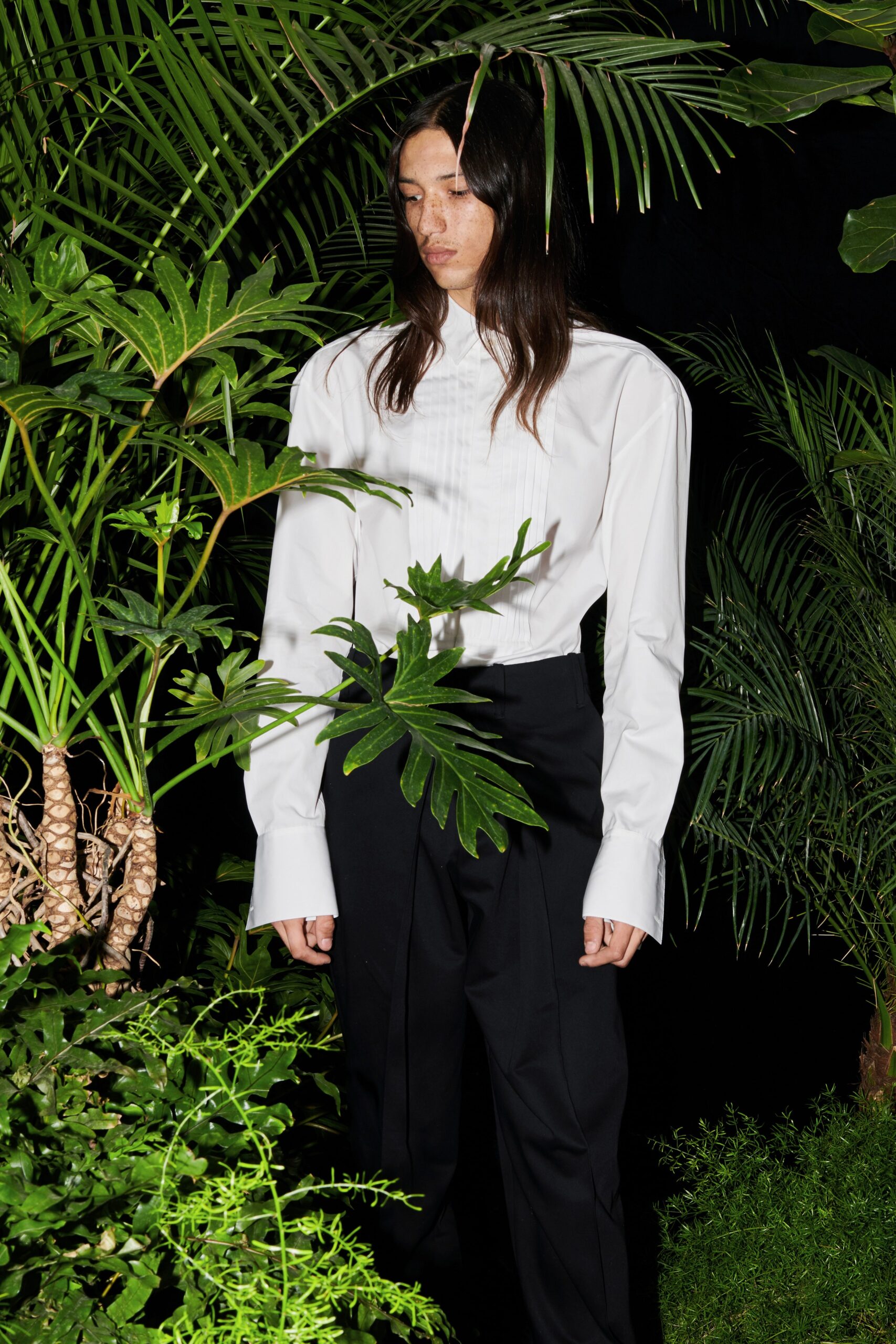 white fitted shirt and black tailored pants