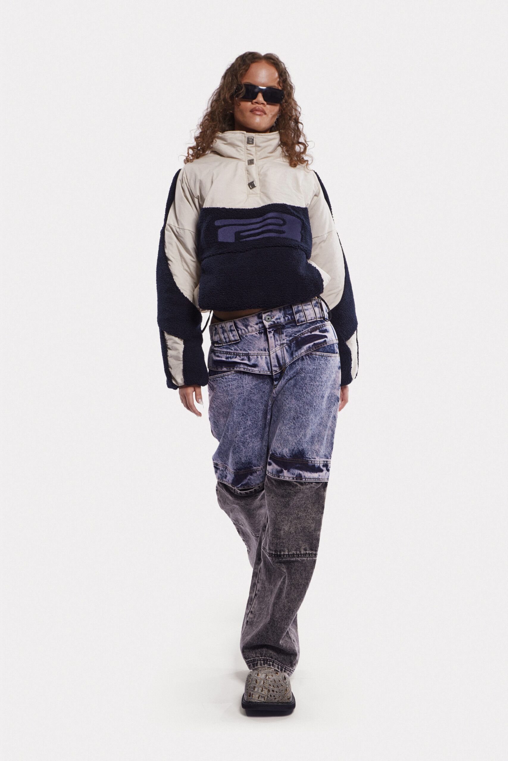 beige relaxed jacket with distressed jeans