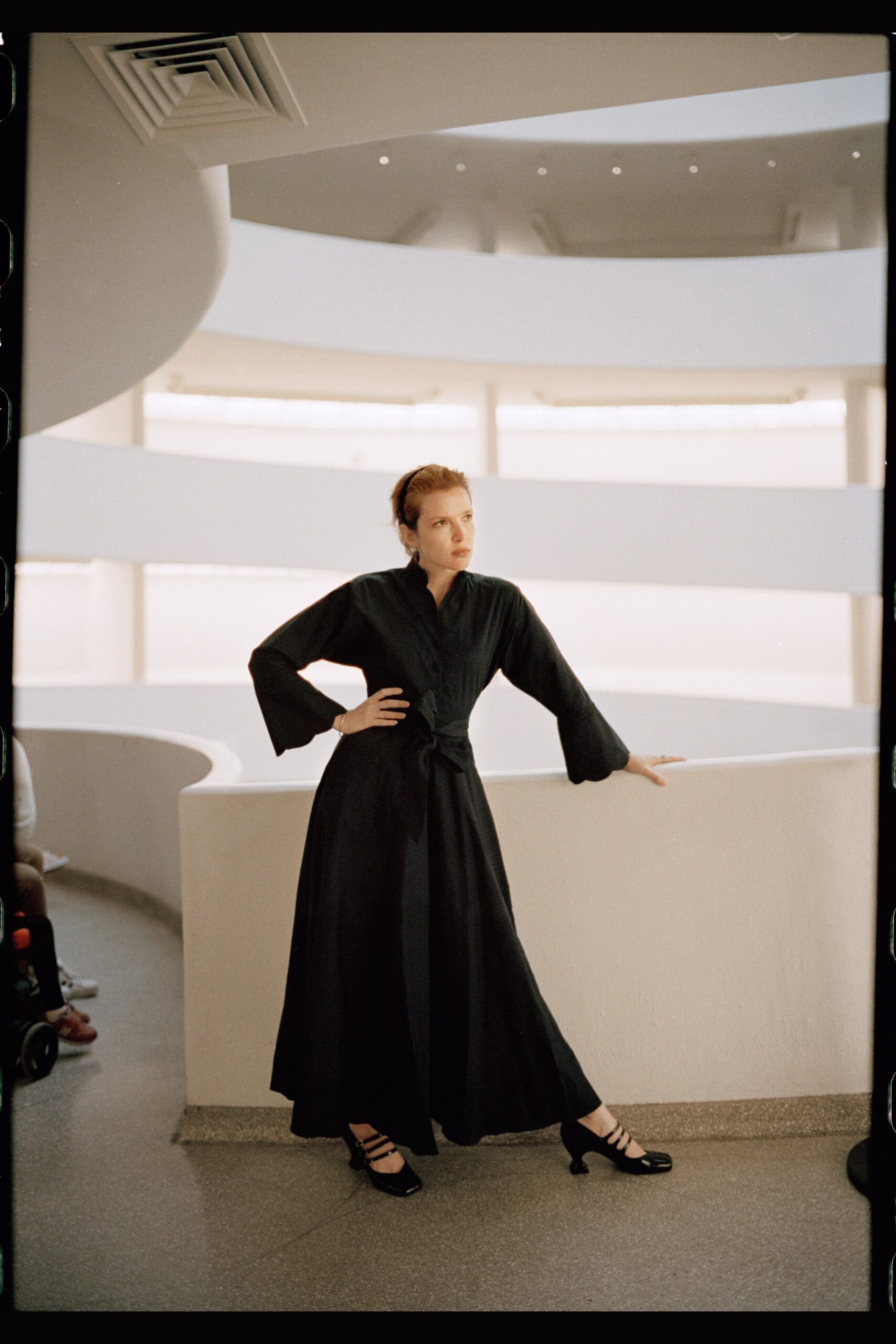 black fitted long-sleeve dress