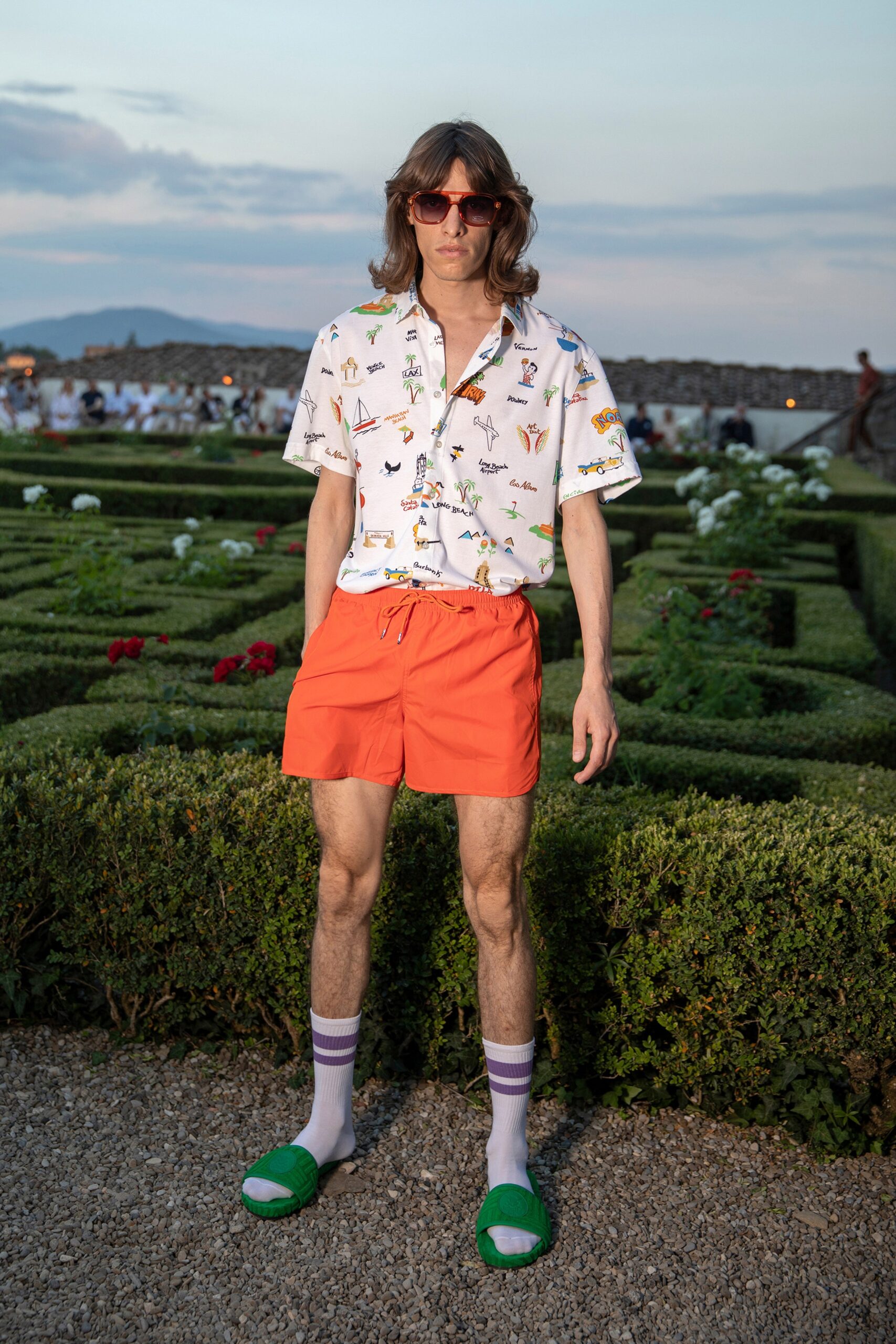 relaxed multi-colored shirt and orange shorts
