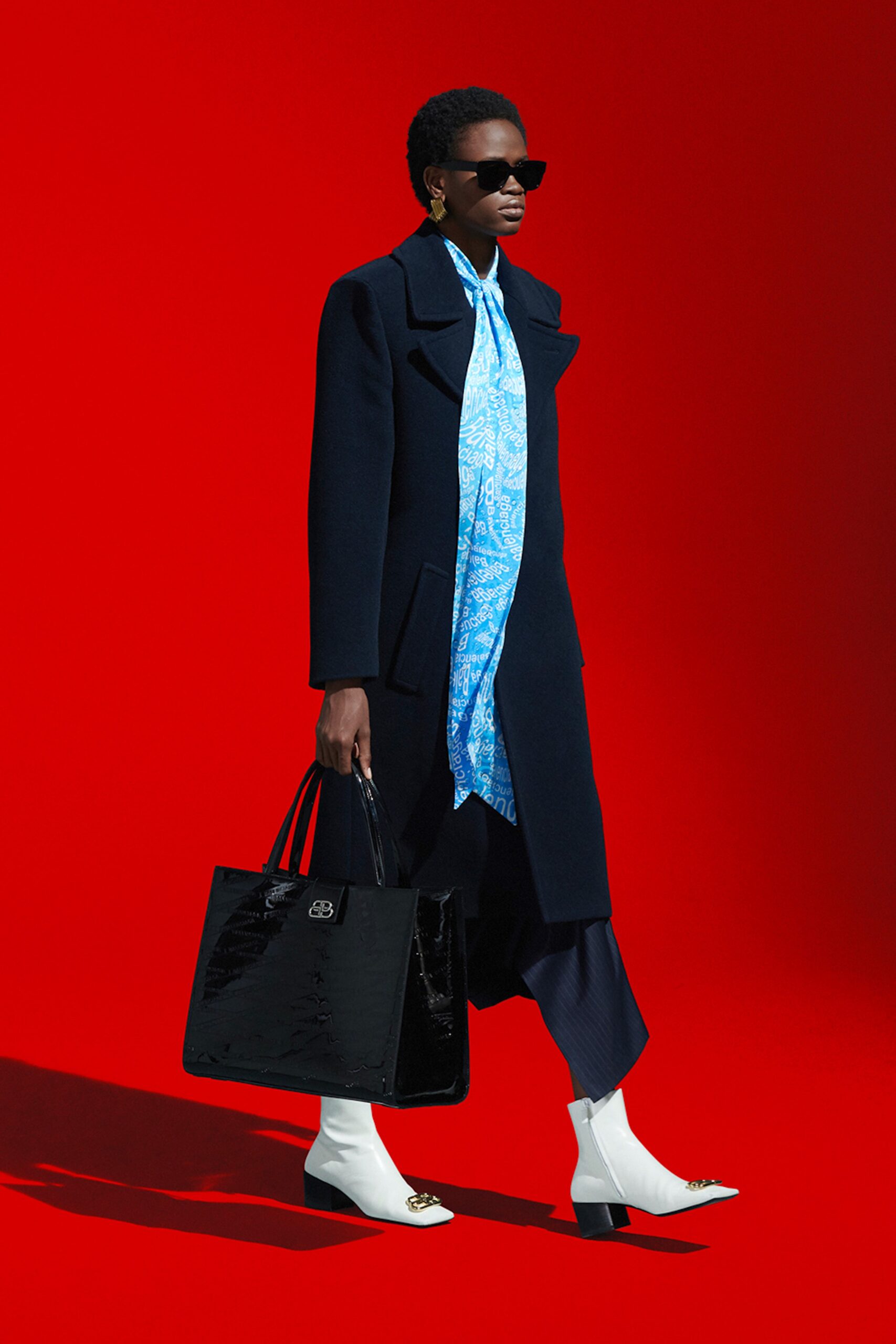 black wool coat with blue scarf