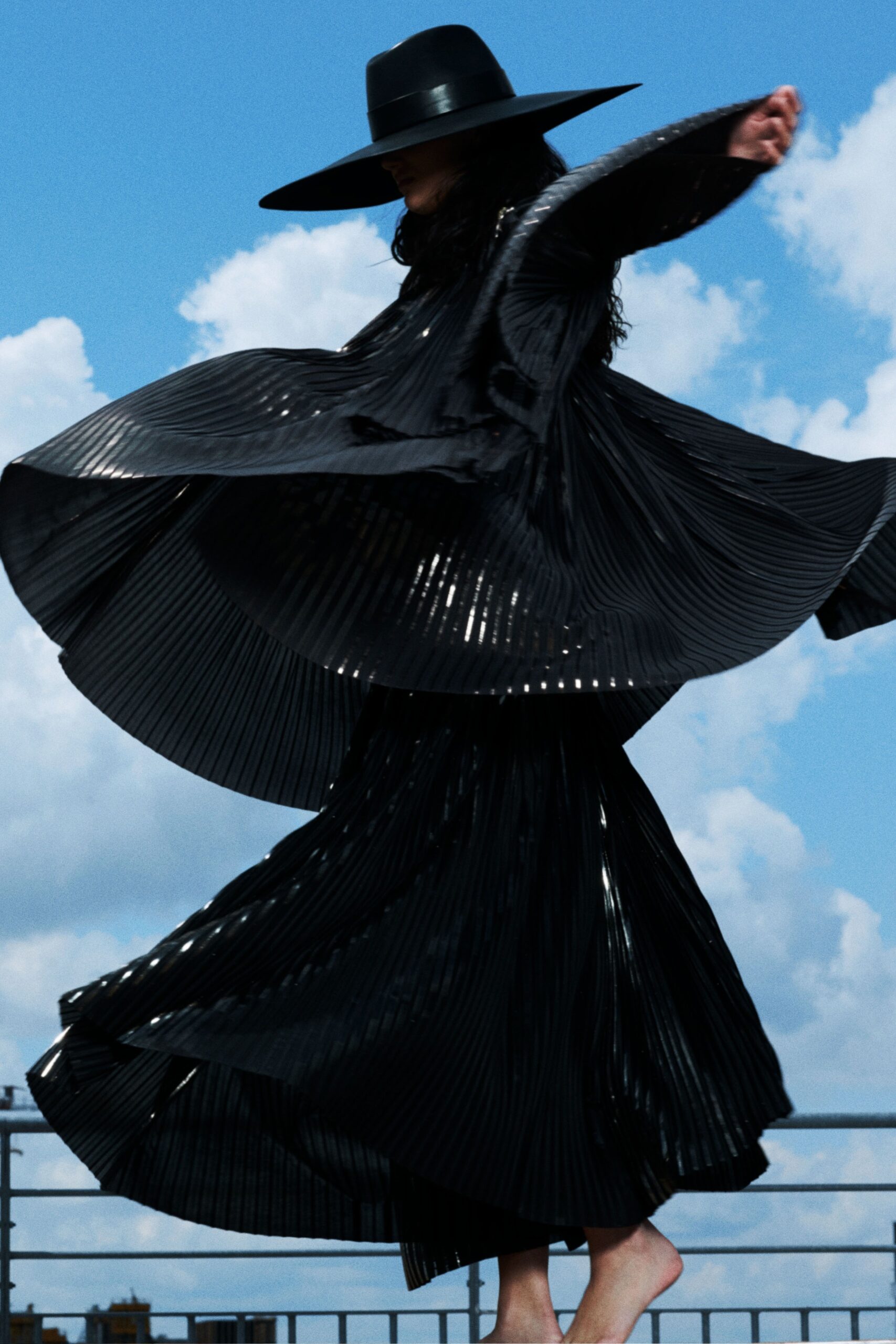 black pleated maxi dress with hat
