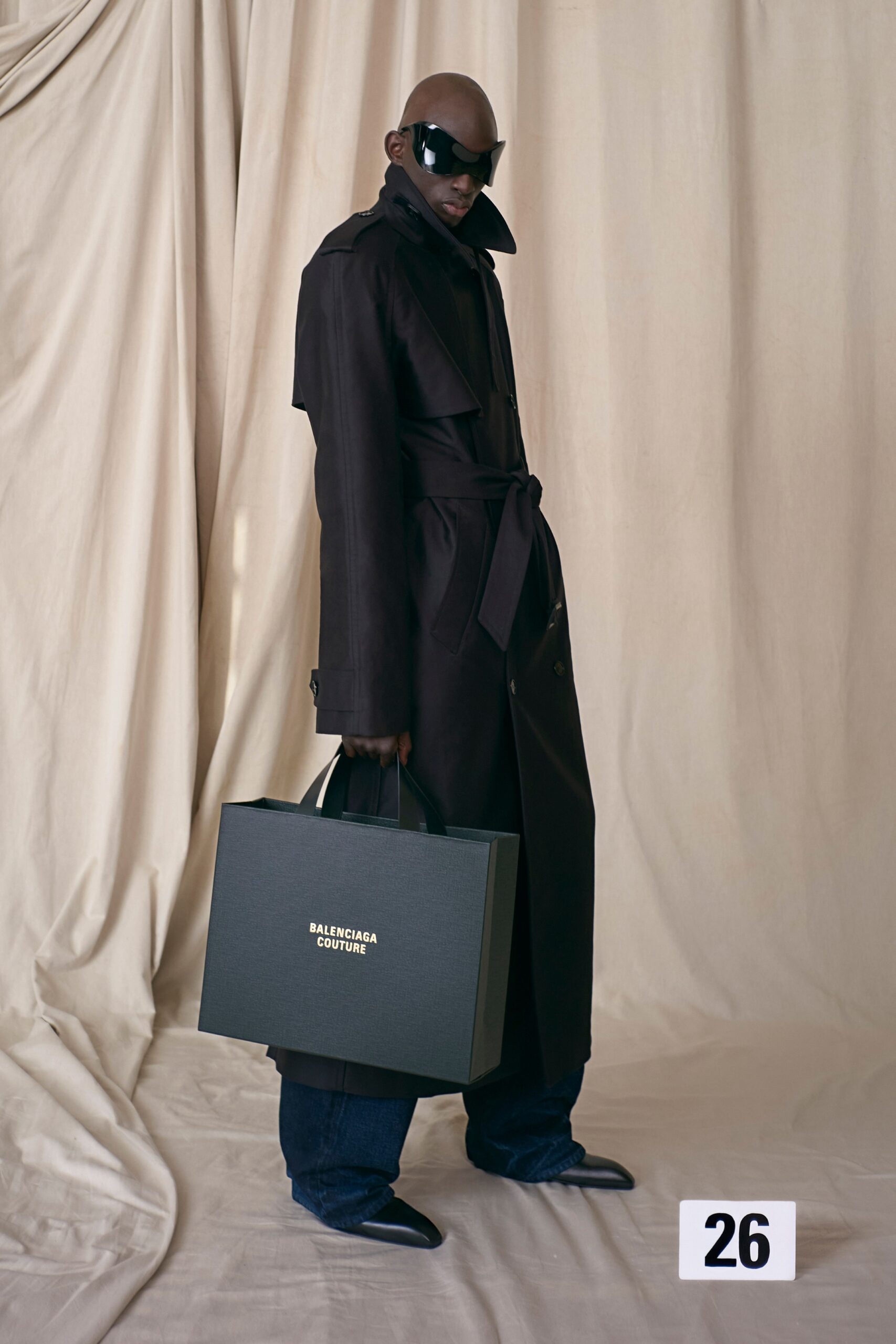 black cotton long-sleeve collared tailored belted trench
