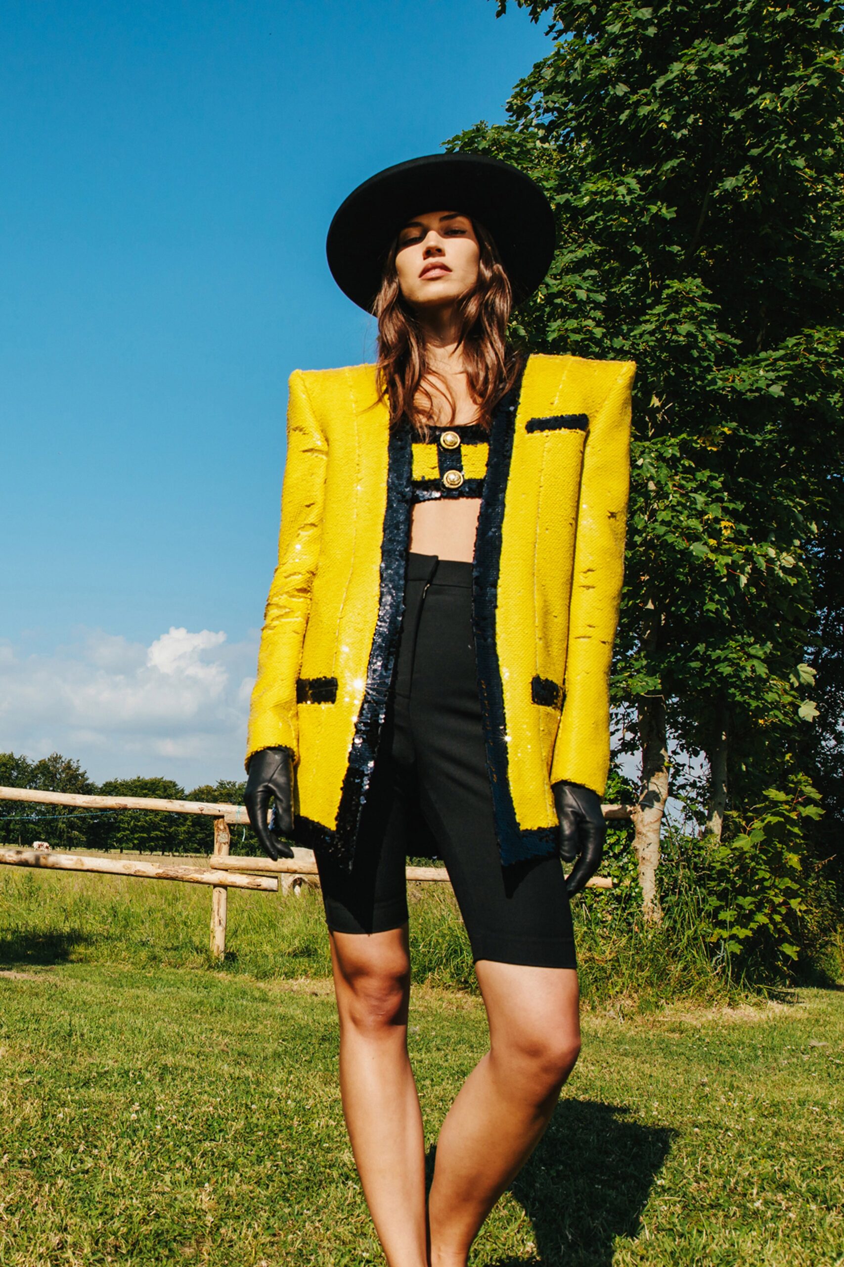 yellow sequin blazer with black top