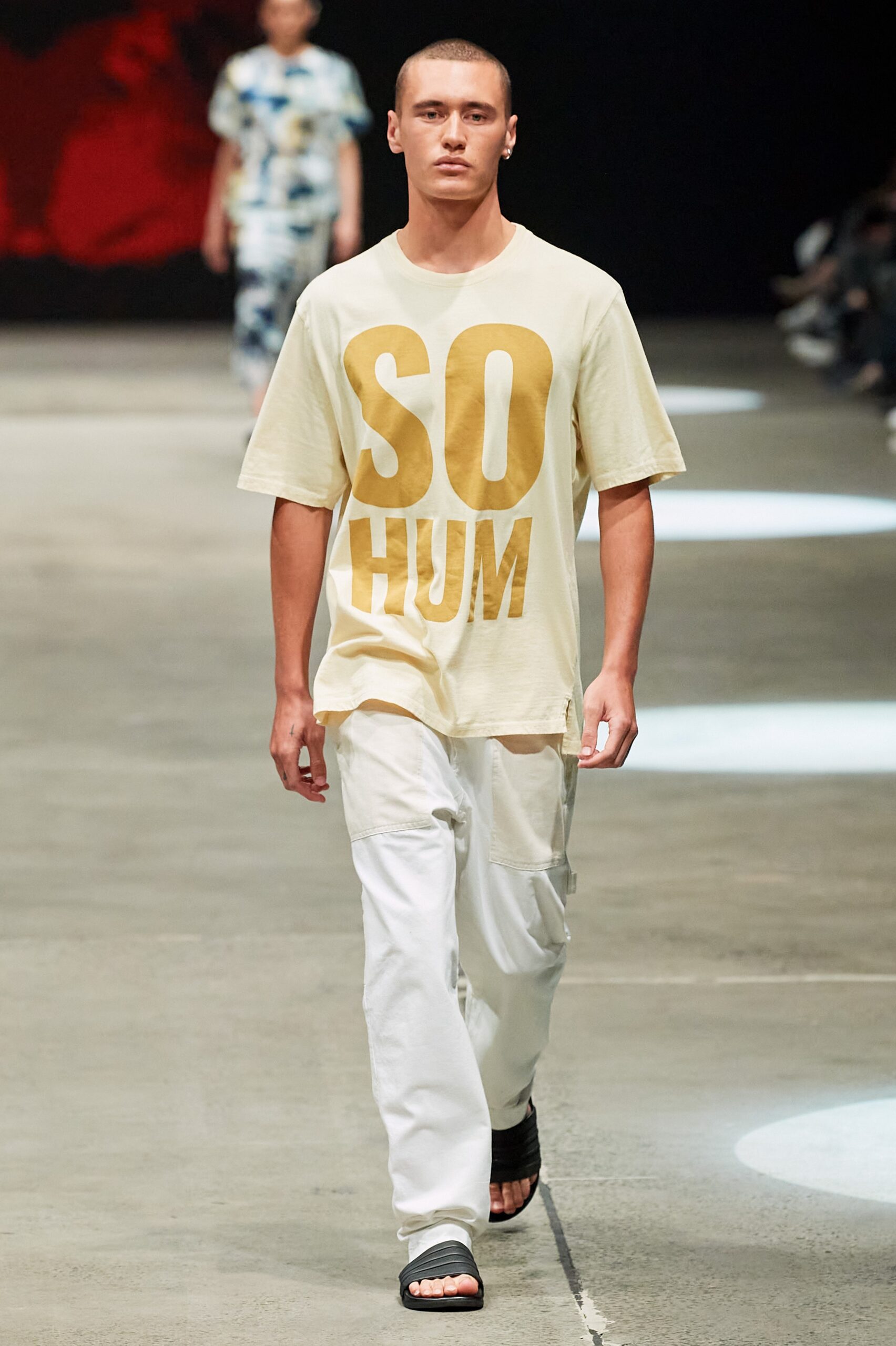 beige printed t-shirt with white pants