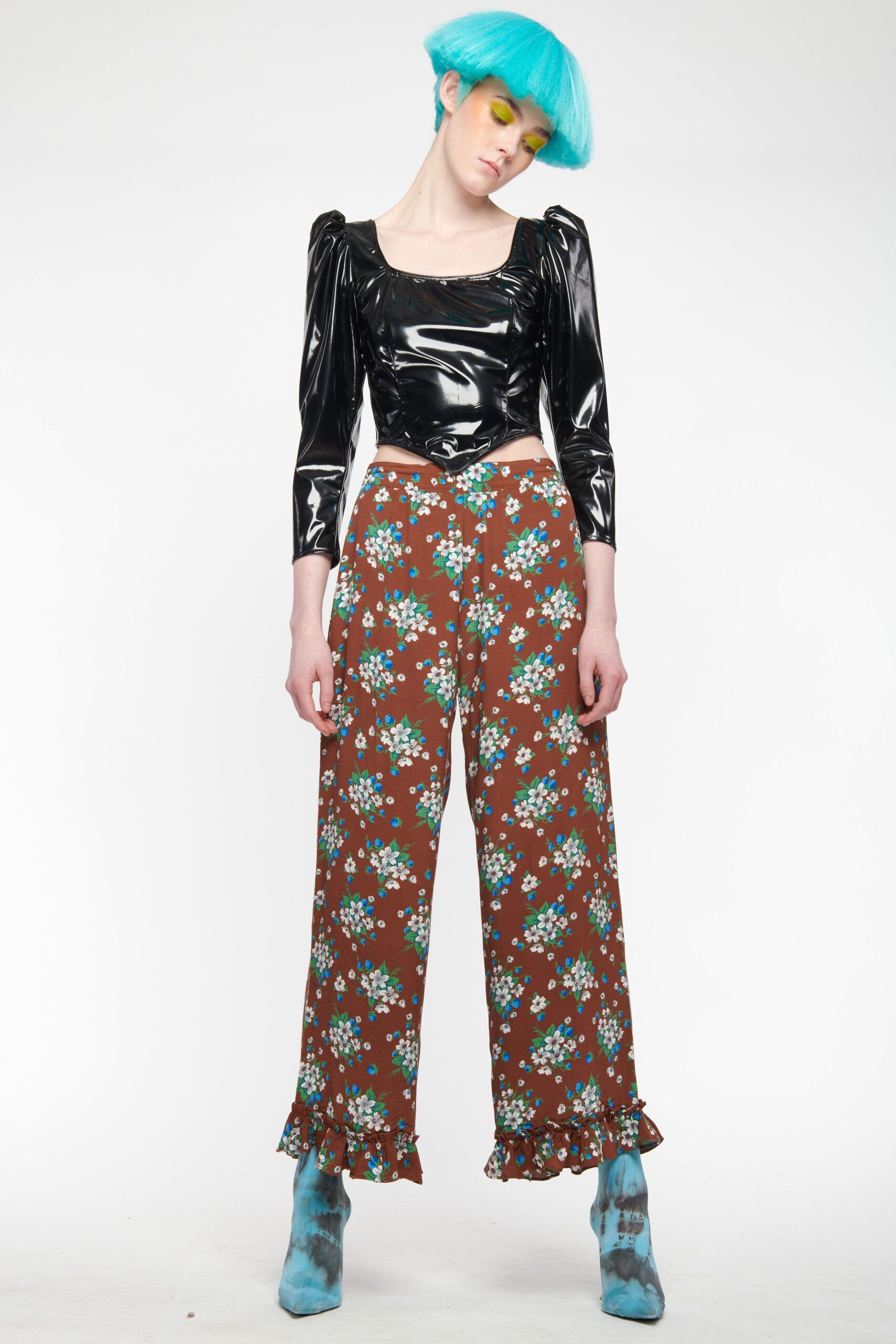 black vinyl fitted top and floral pants