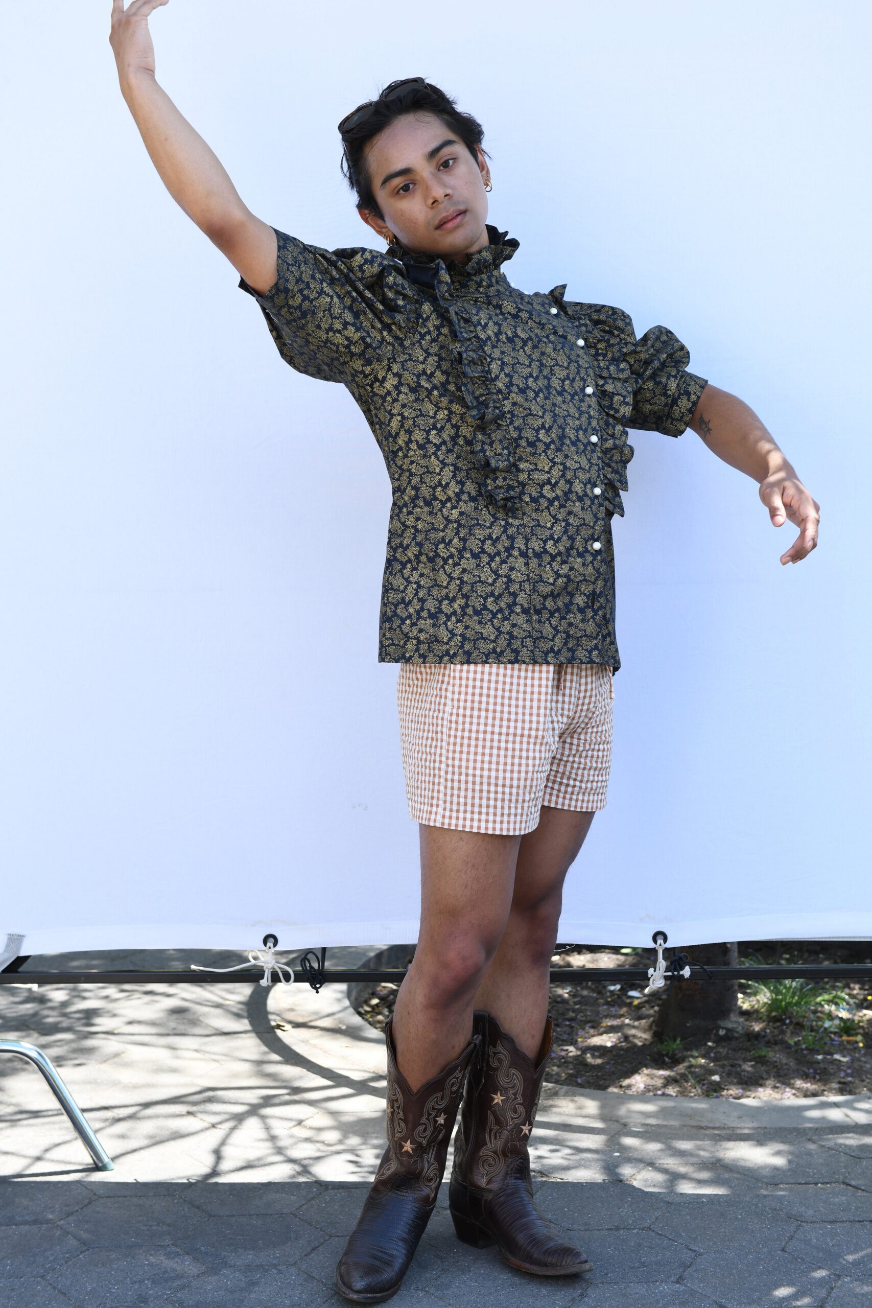 black and gold ruffled shirt with shorts