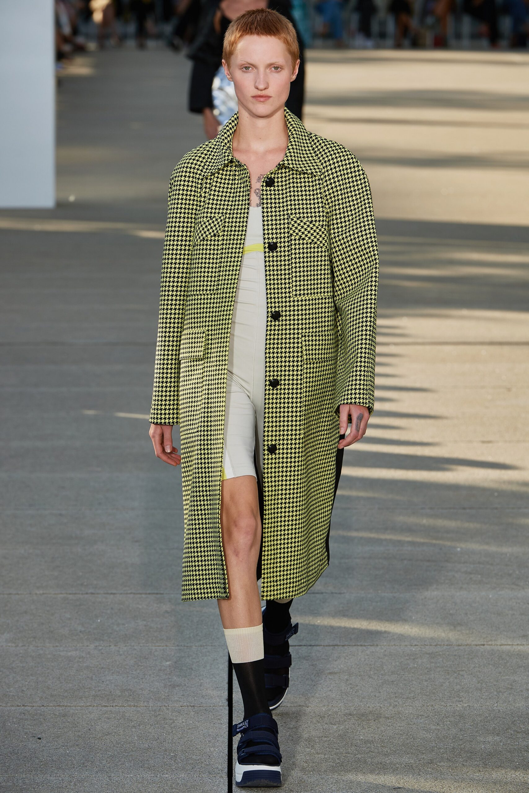 yellow black checked coat with bodysuit