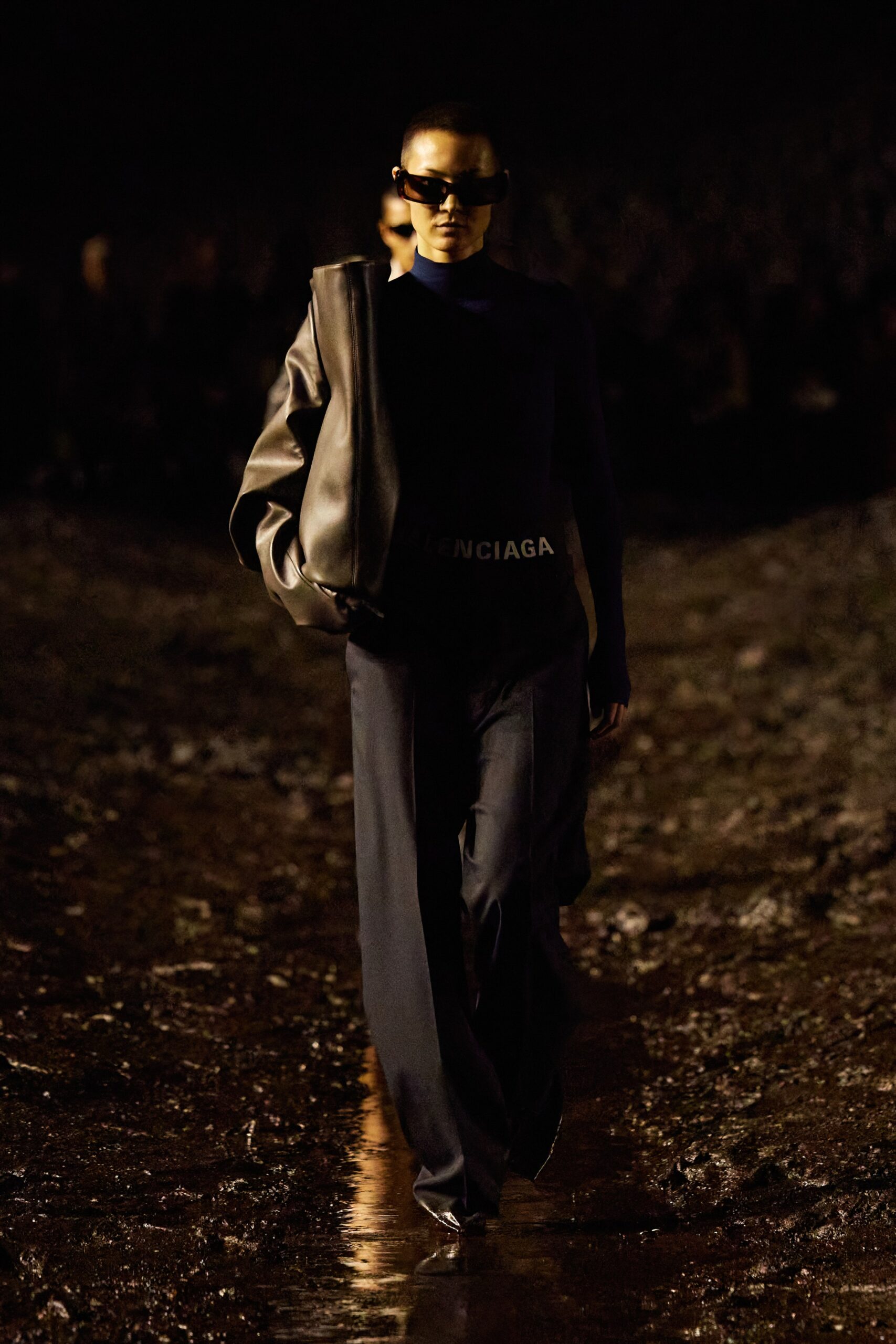 black leather jacket and relaxed pants