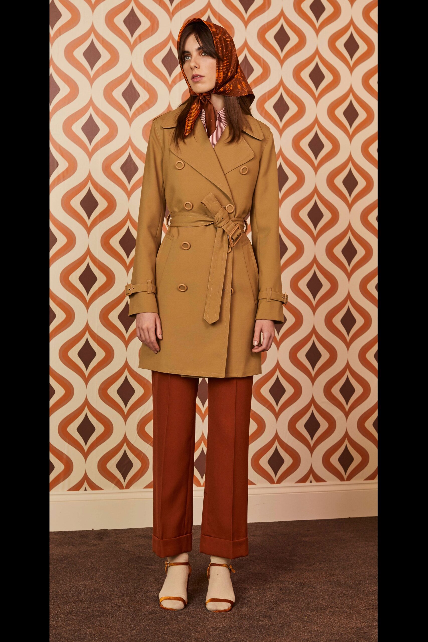 beige tailored coat with brown pants