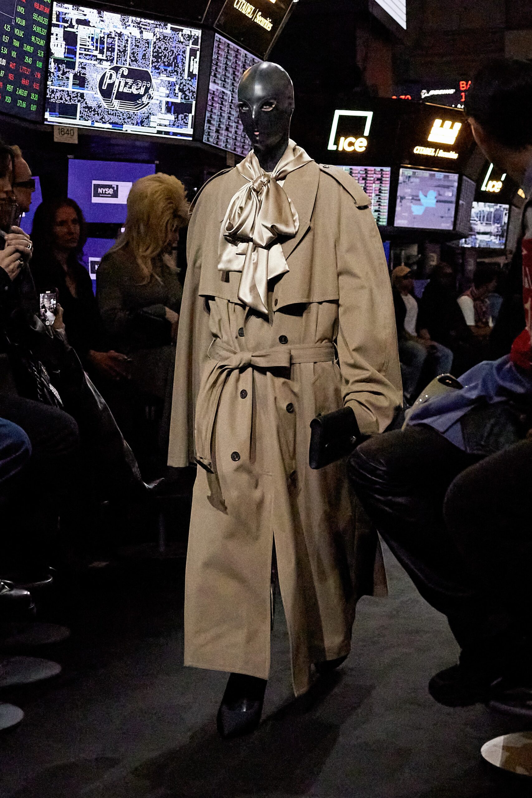 beige trench coat with white blouse