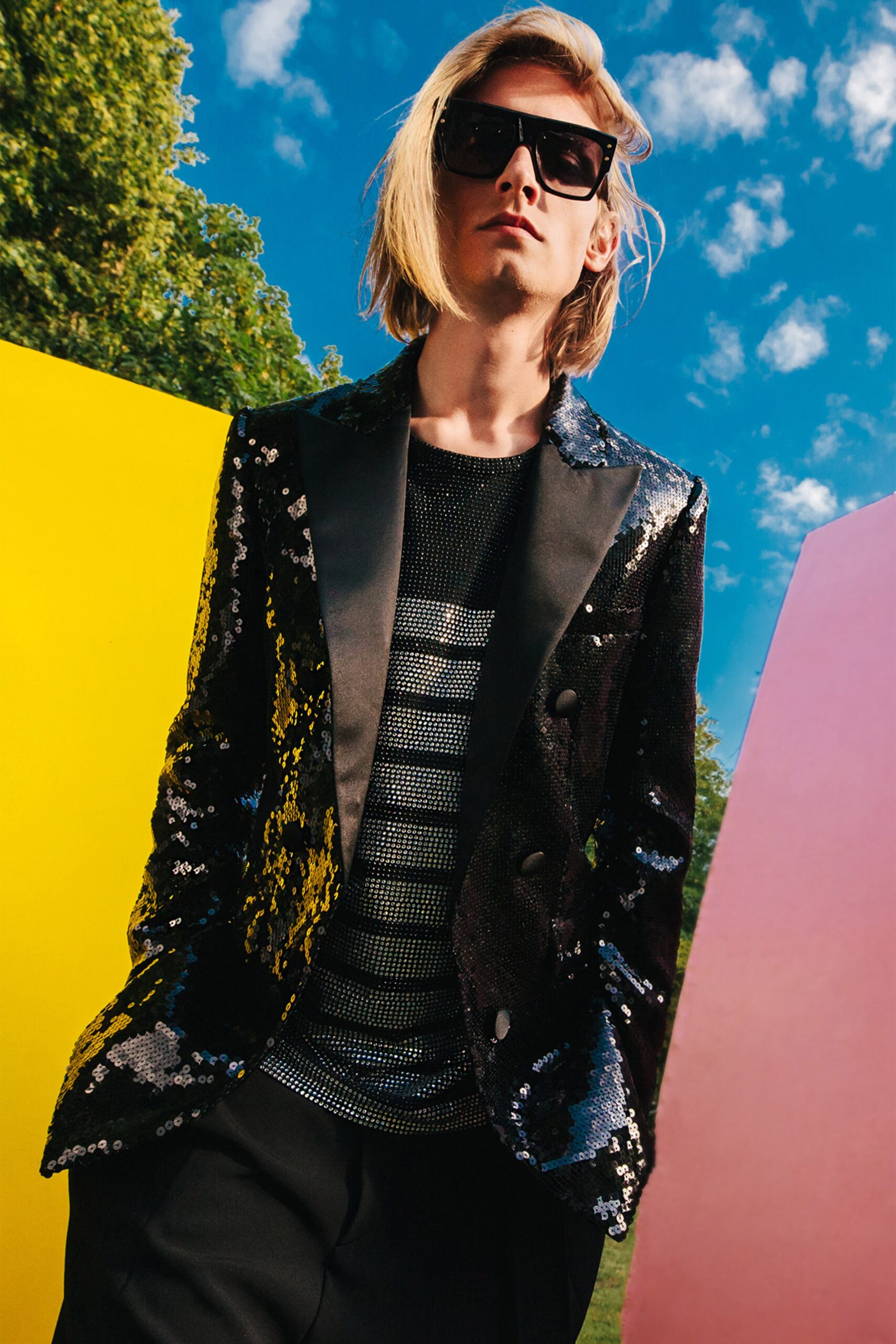 black sequined blazer with striped top