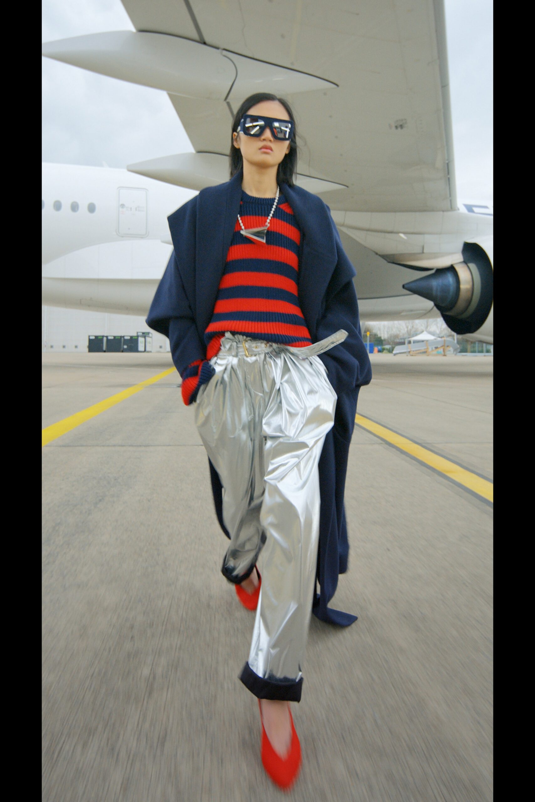 red and blue striped sweater with silver pants