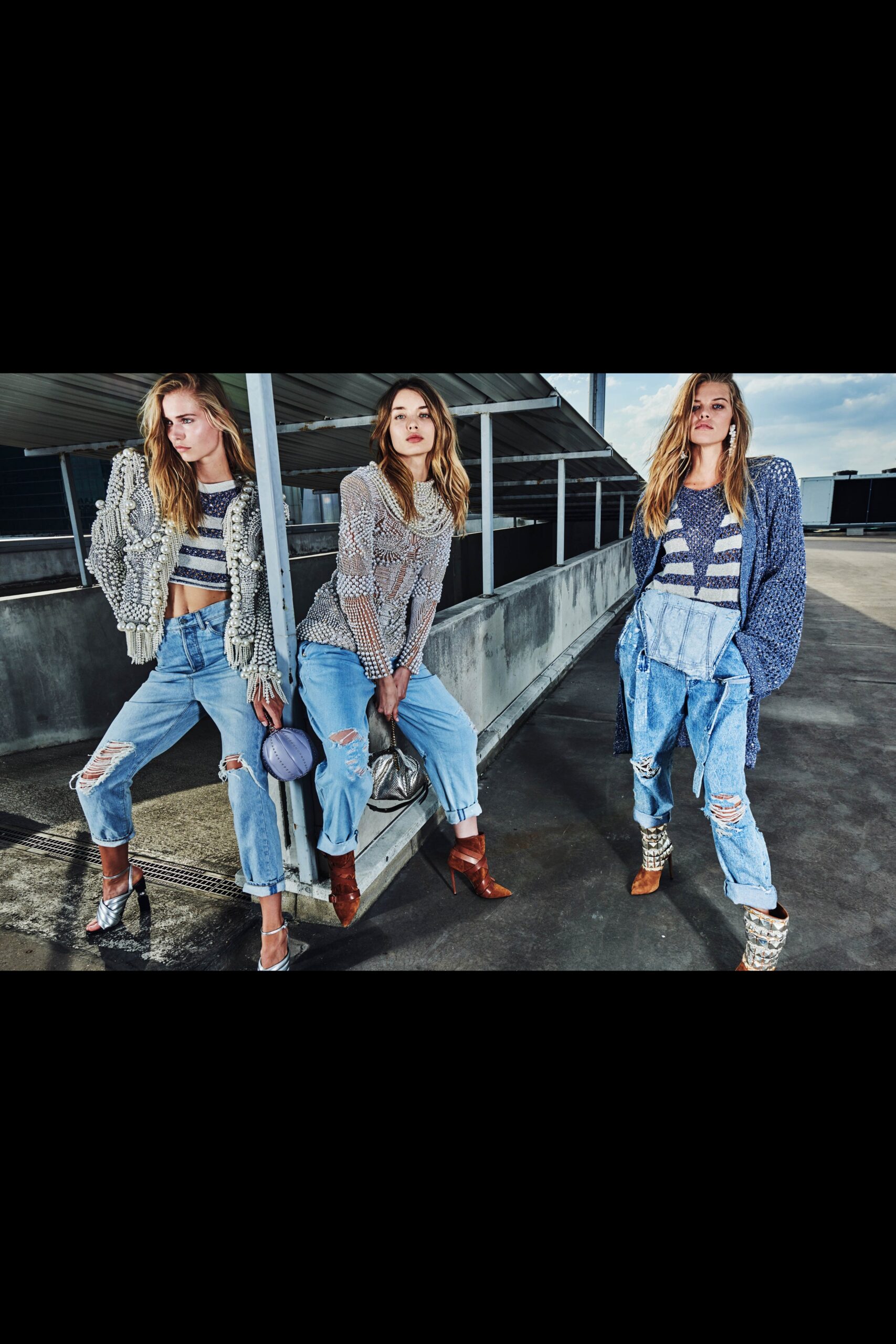 relaxed gray blue top with distressed denim
