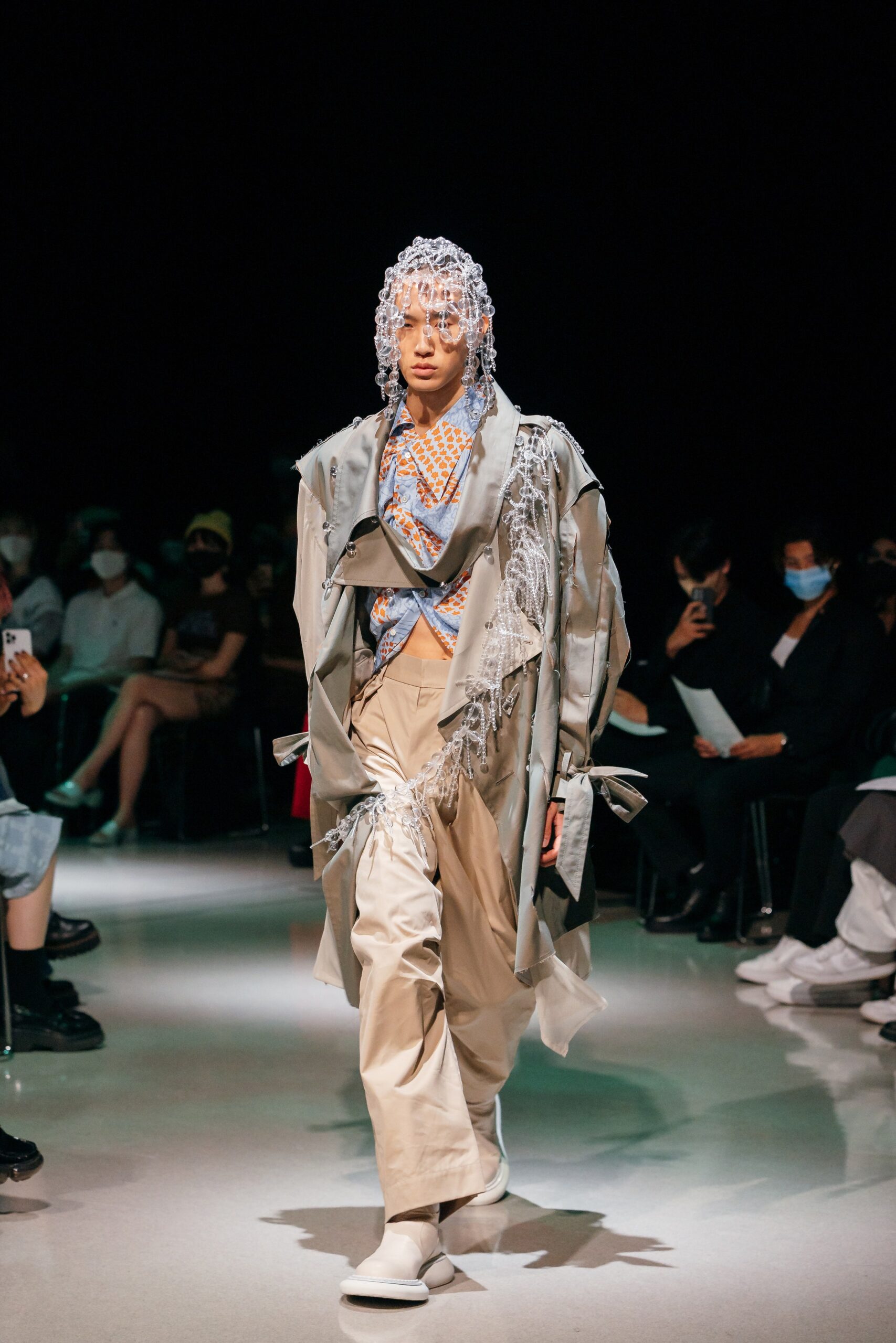 gray trench coat with beige pants
