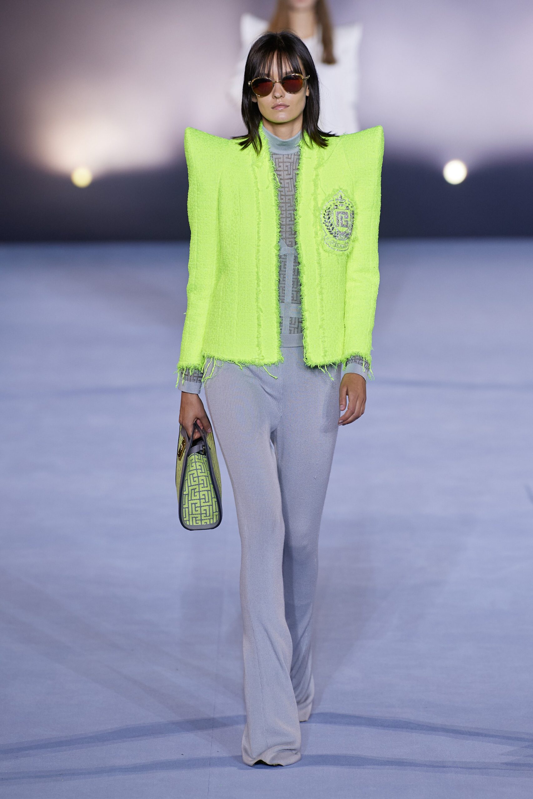 neon green structured jacket with flared pants