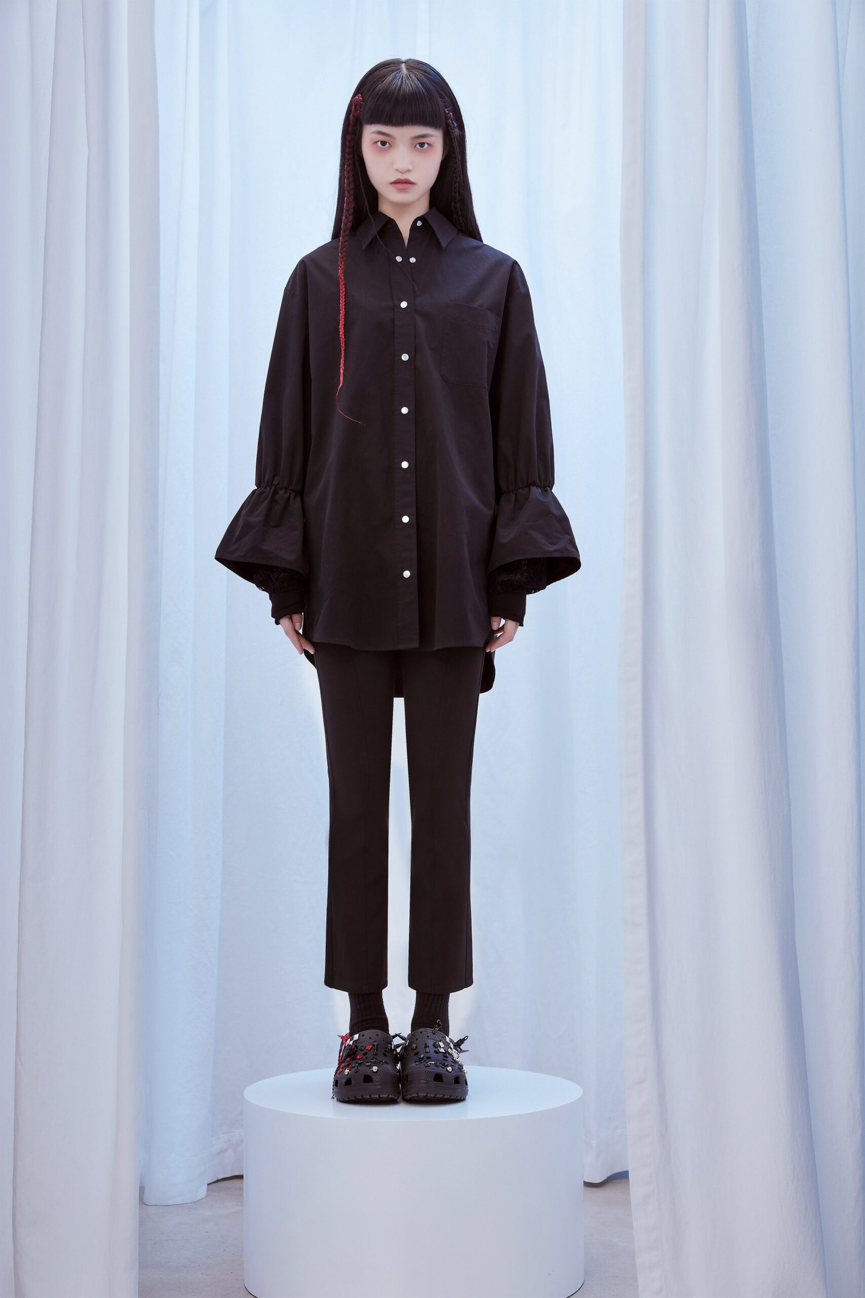 black relaxed shirt and fitted pants