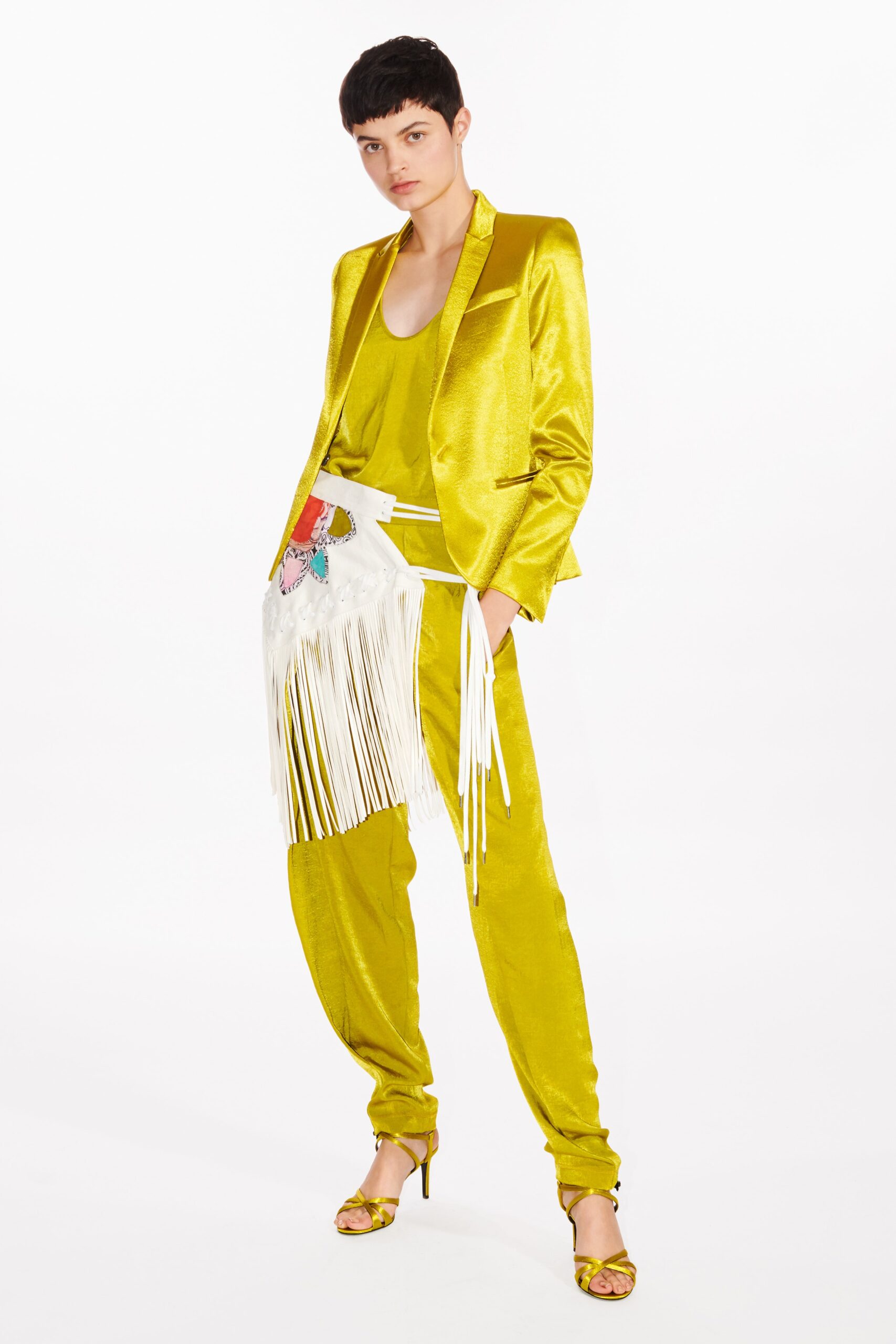 yellow silk suit with fringed bag