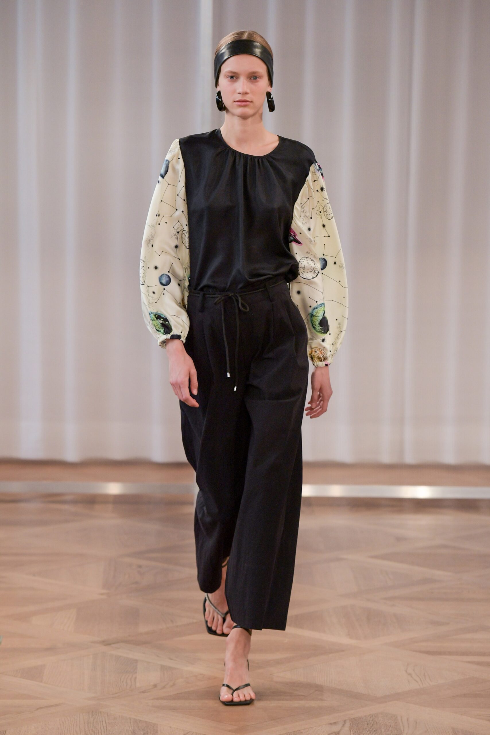 black and white embroidered top with wide-leg pants