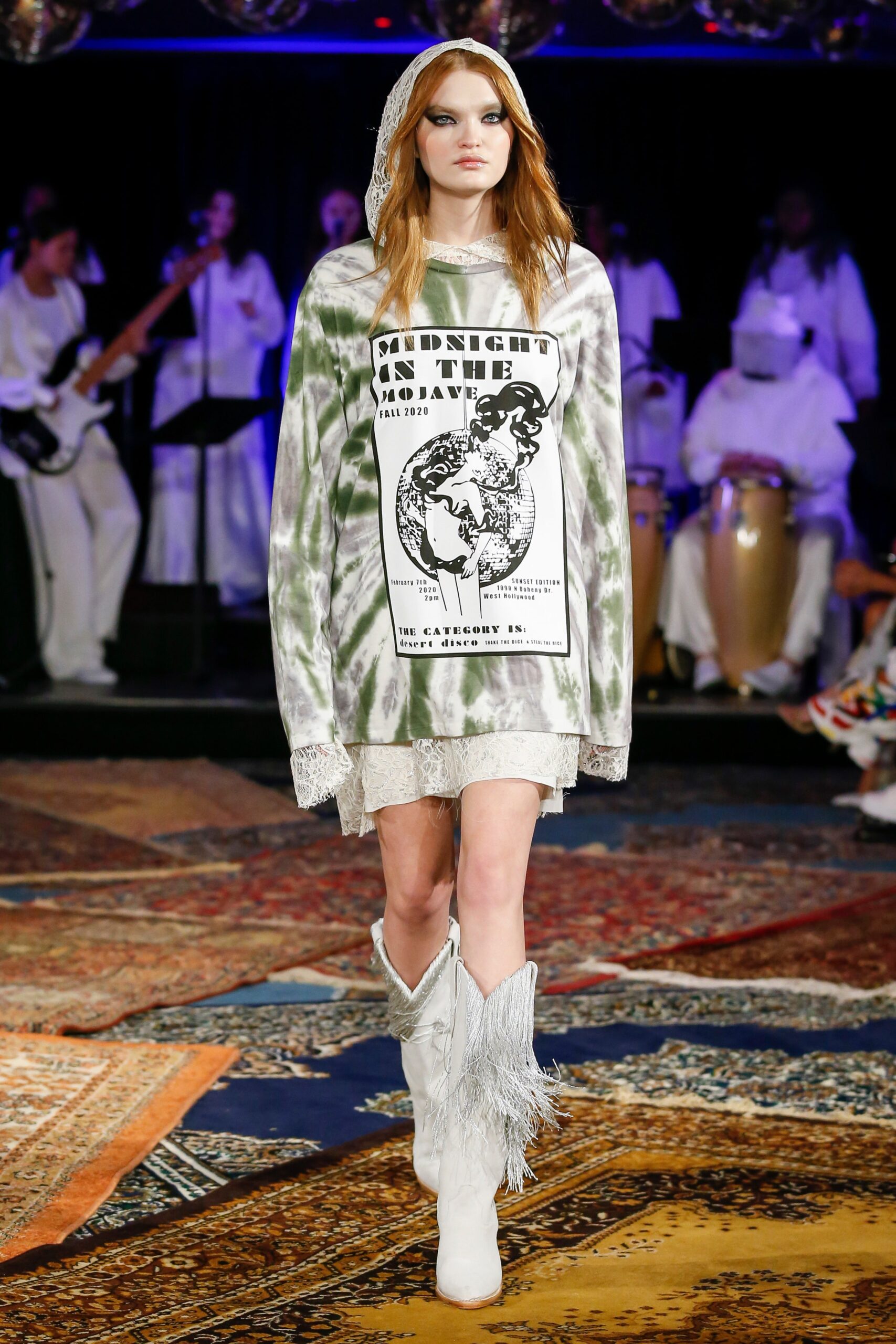 green printed hooded dress with white boots