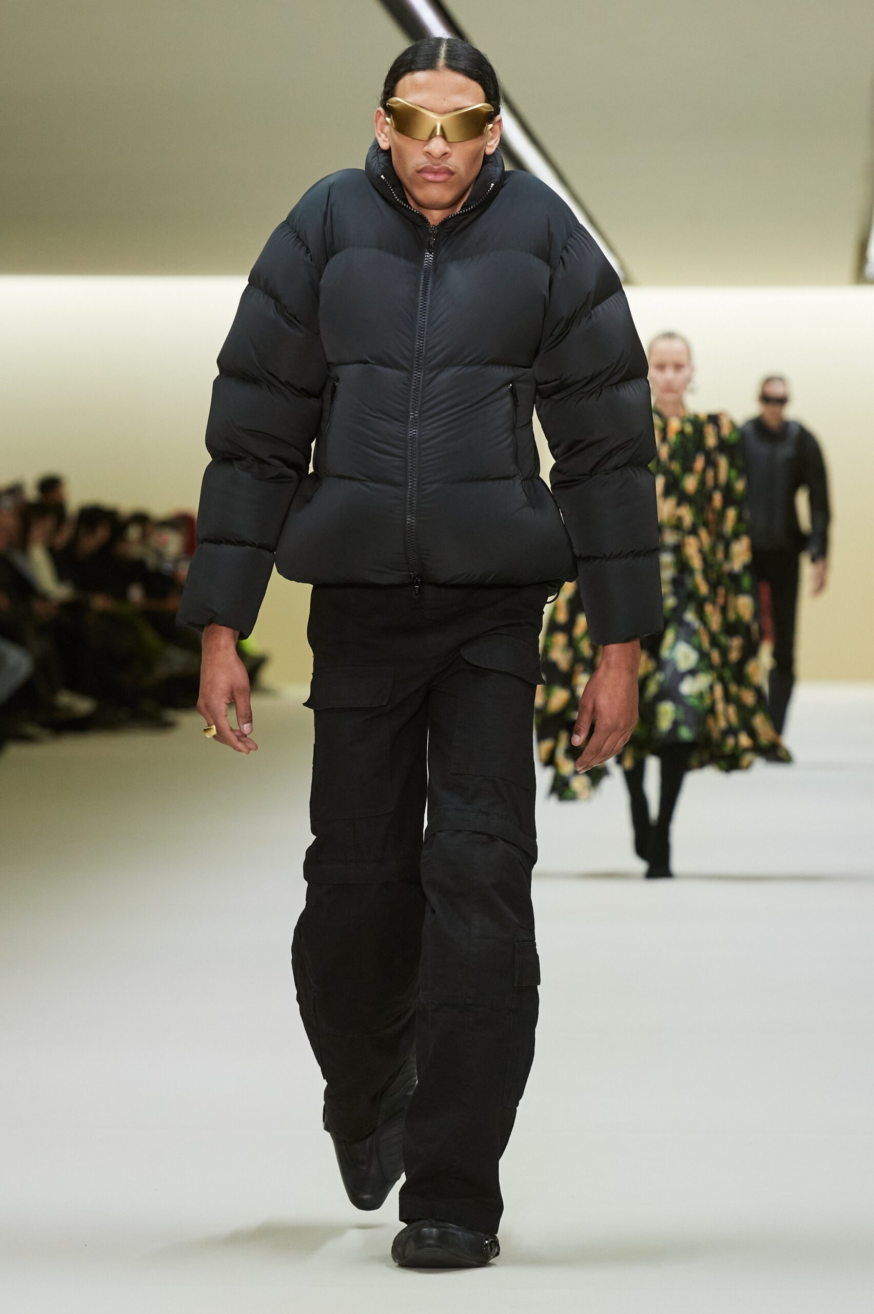 black padded jacket with cargo pants